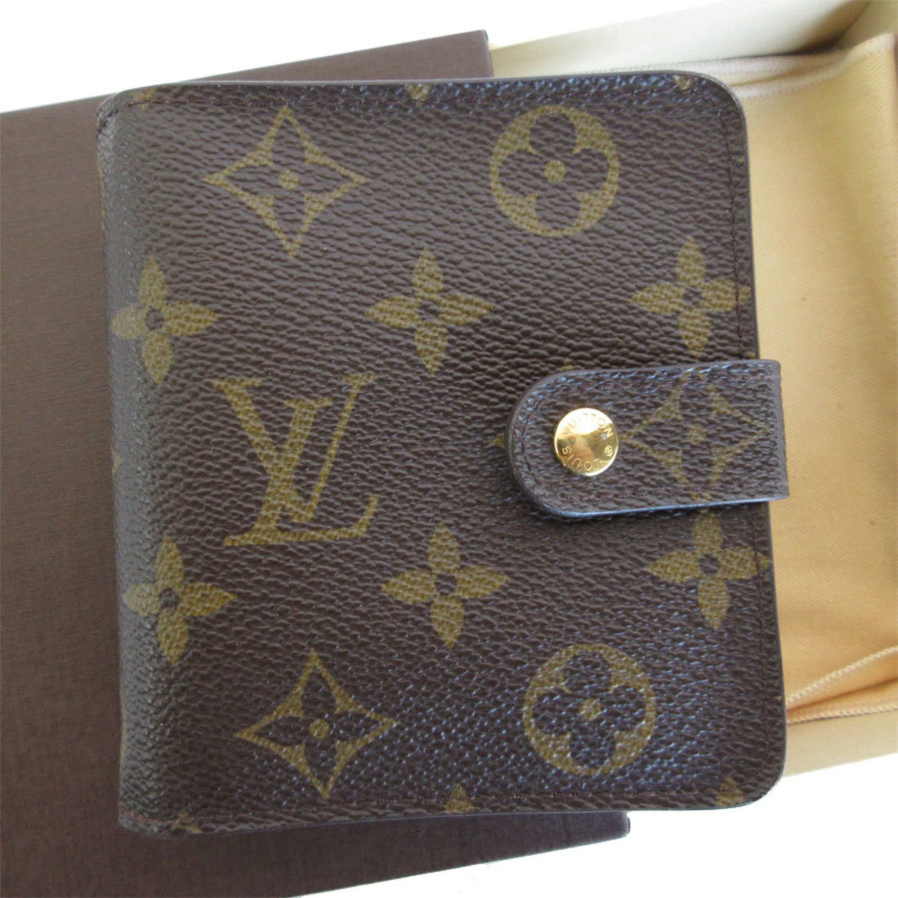 Louis Vuitton Bi-fold wallet Monogram Compact Zip canvas Gold Men's