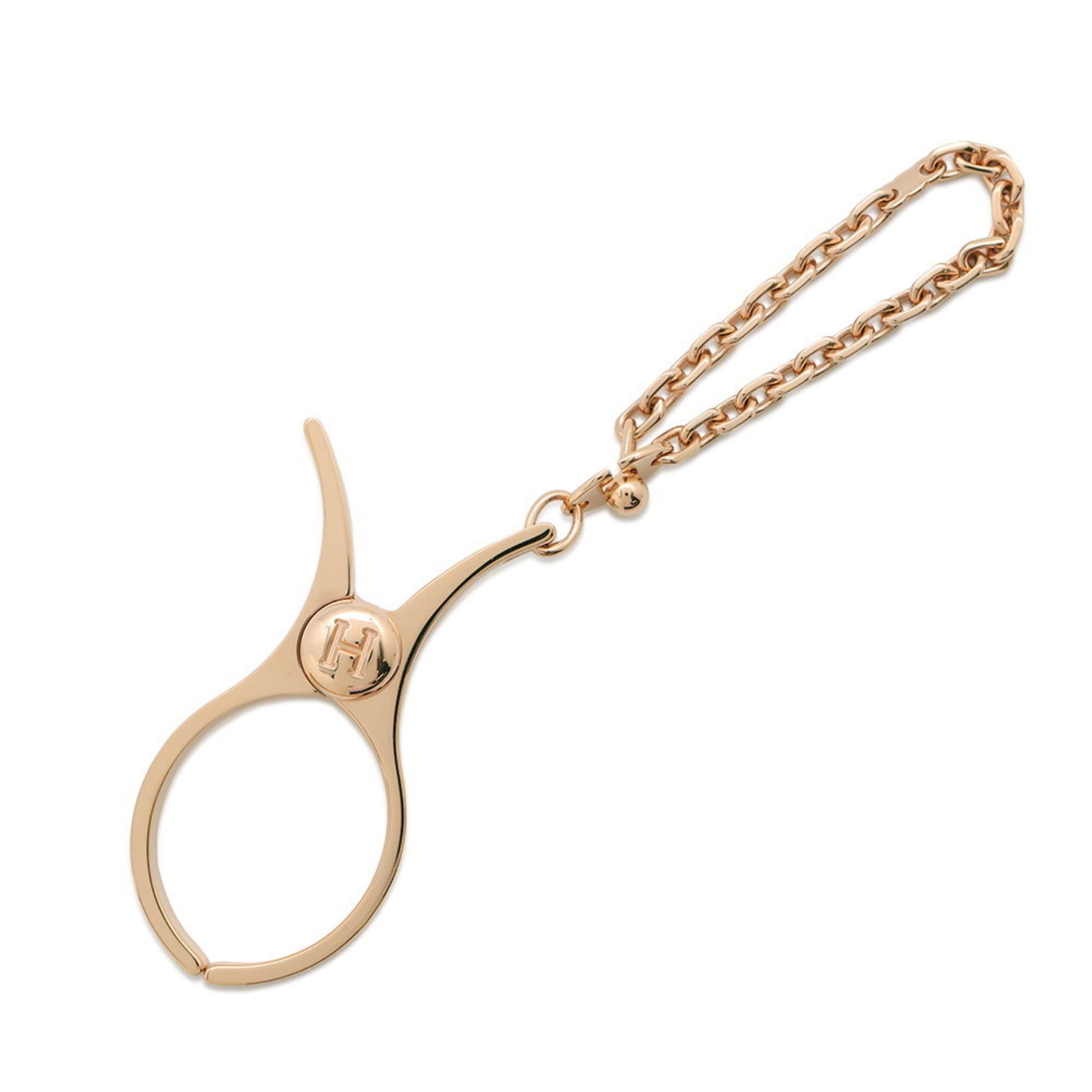 Hermes Hermès Filou glove holder in Dore Rose metal.