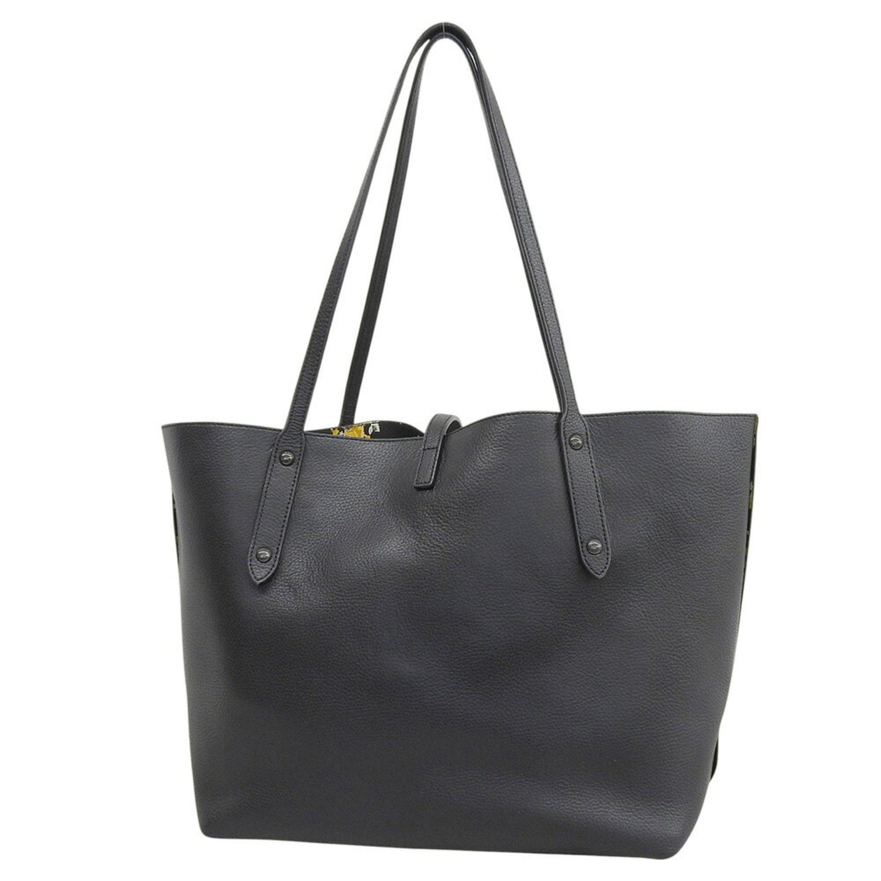 Like new Coach Market Tote Prairie leather with floral print.