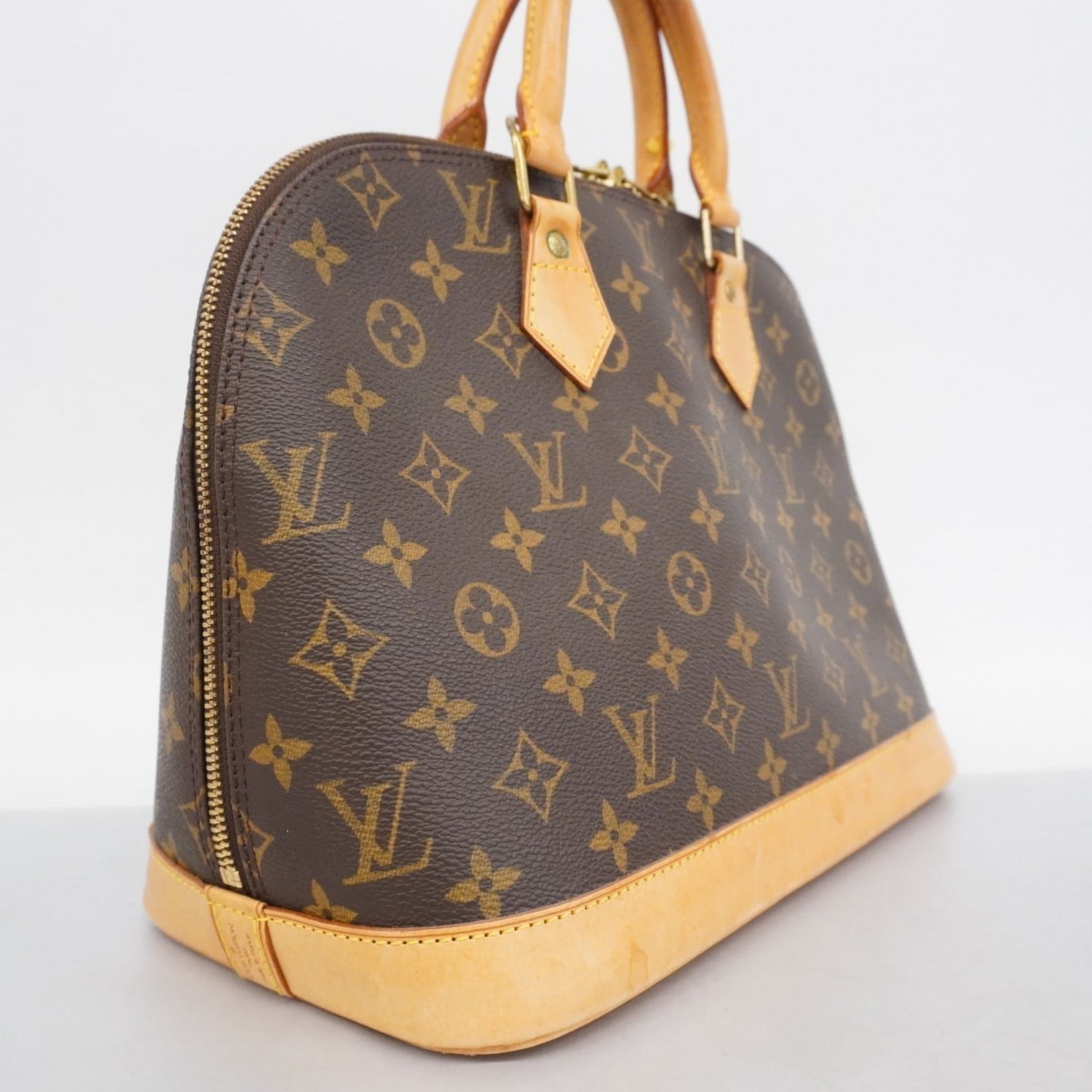 Louis Vuitton Monogram Alma Handbag