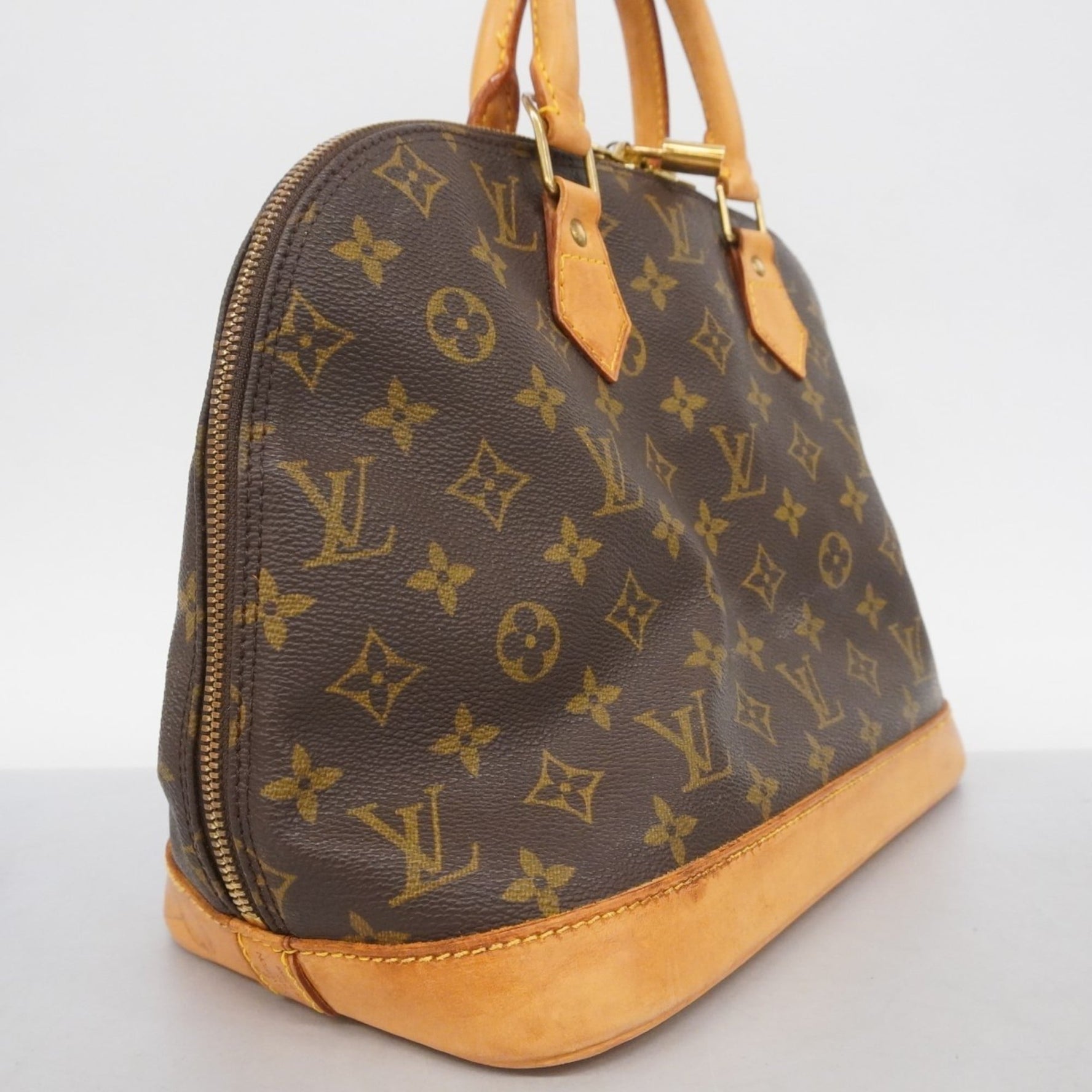 Louis Vuitton Alma Handbag