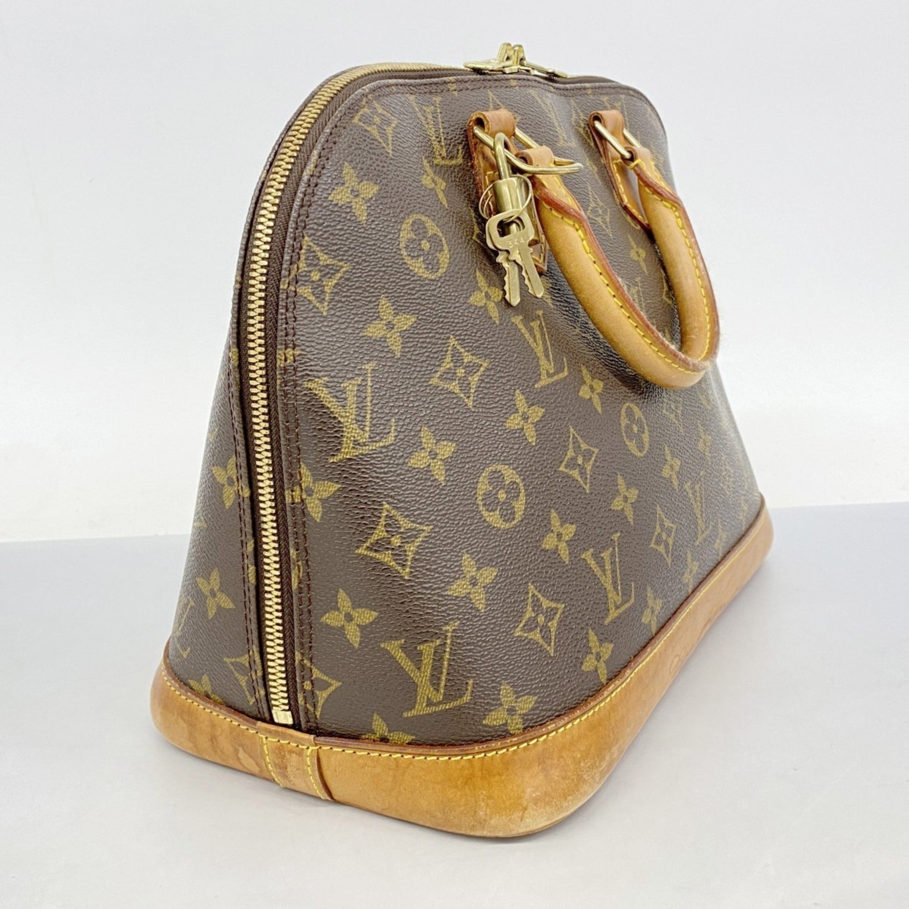 Louis Vuitton Monogram Alma Handbag