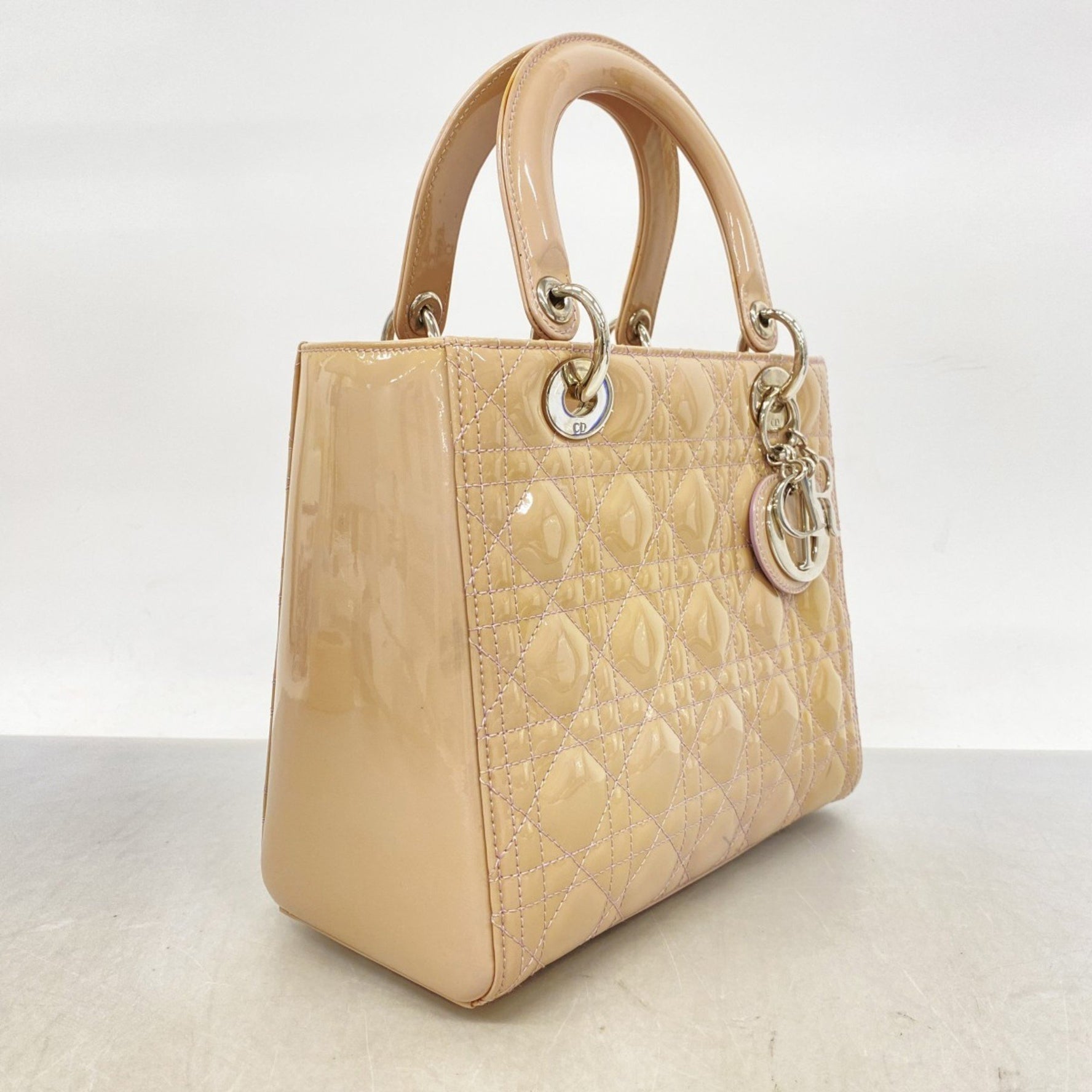 Christian Dior Cannage Lady handbag in beige and purple, a bag .