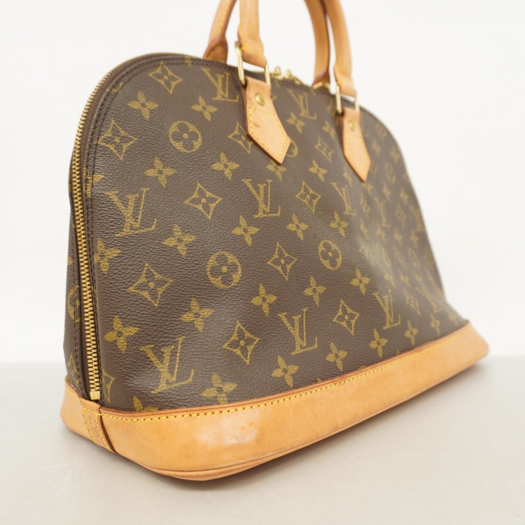 Louis Vuitton Monogram Alma Handbag