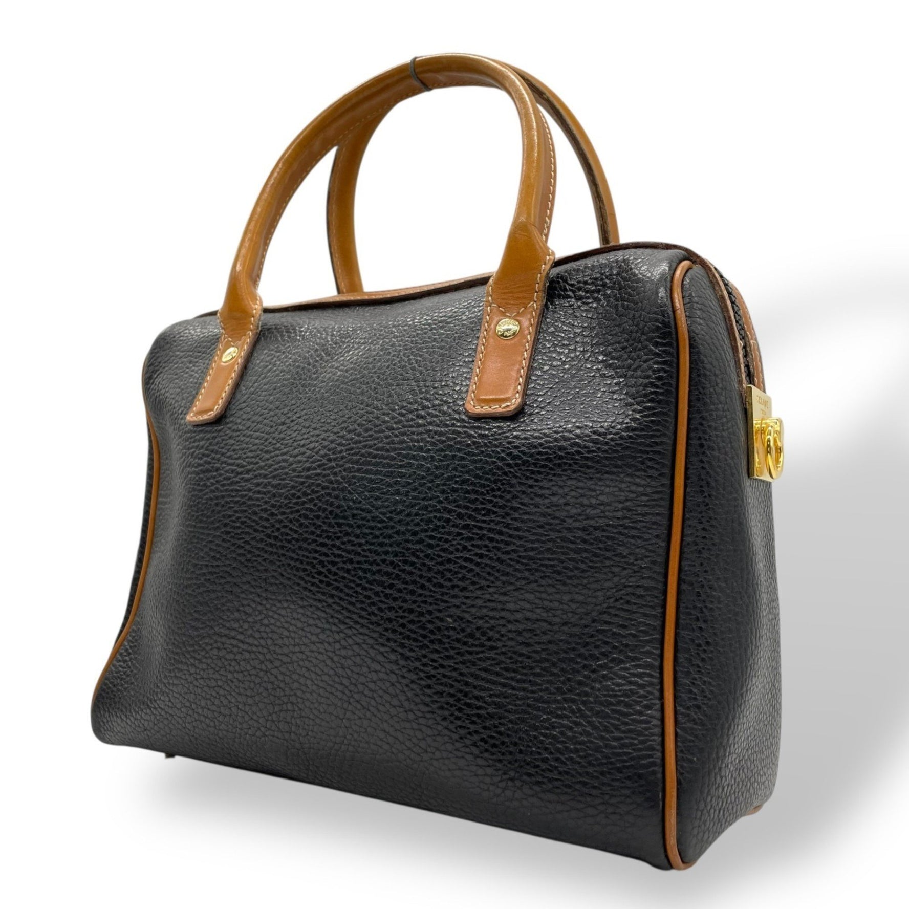 Celine Boston bag style leather handbag in black and brown with gold hardware.