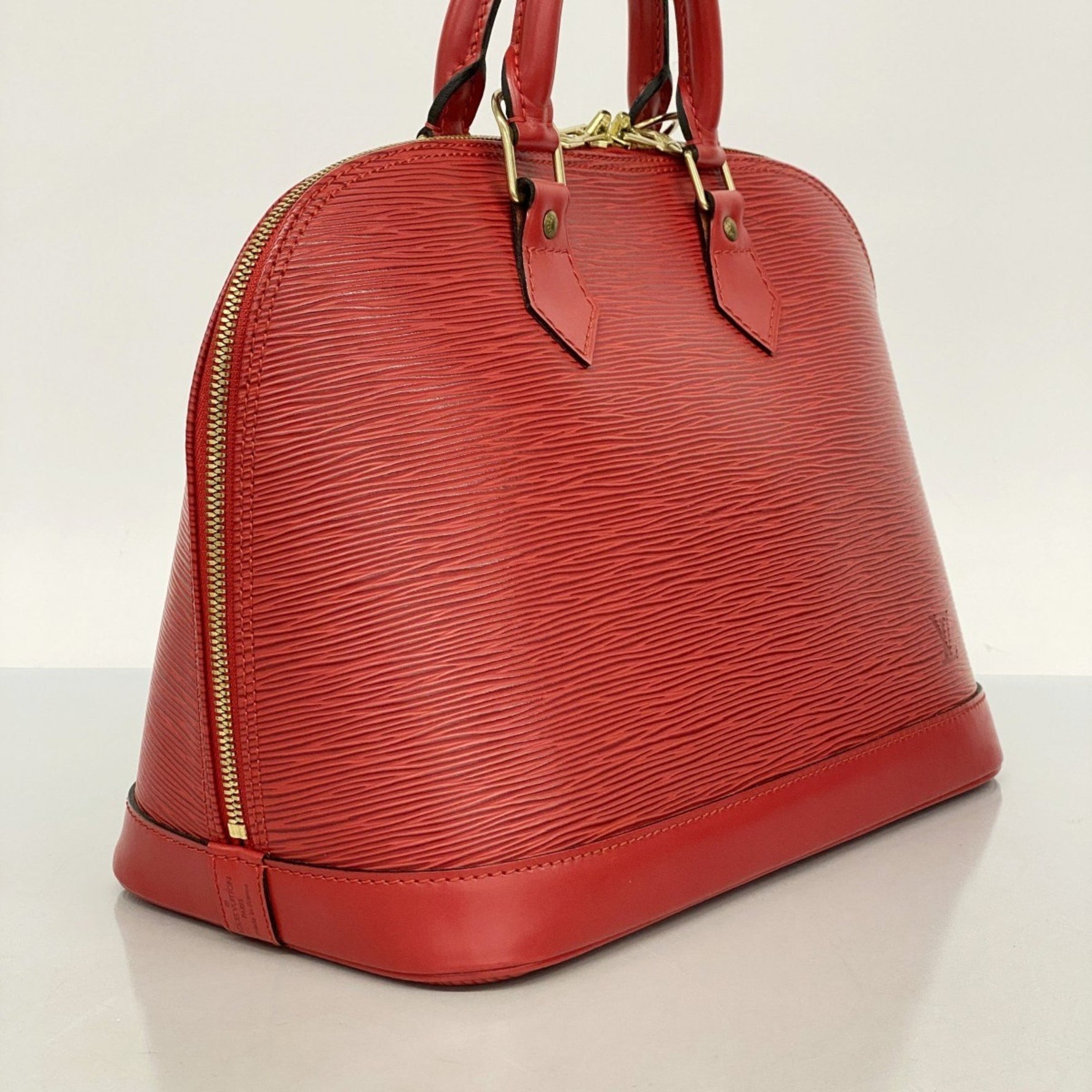 Louis Vuitton Epi Alma Handbag Castilian Red