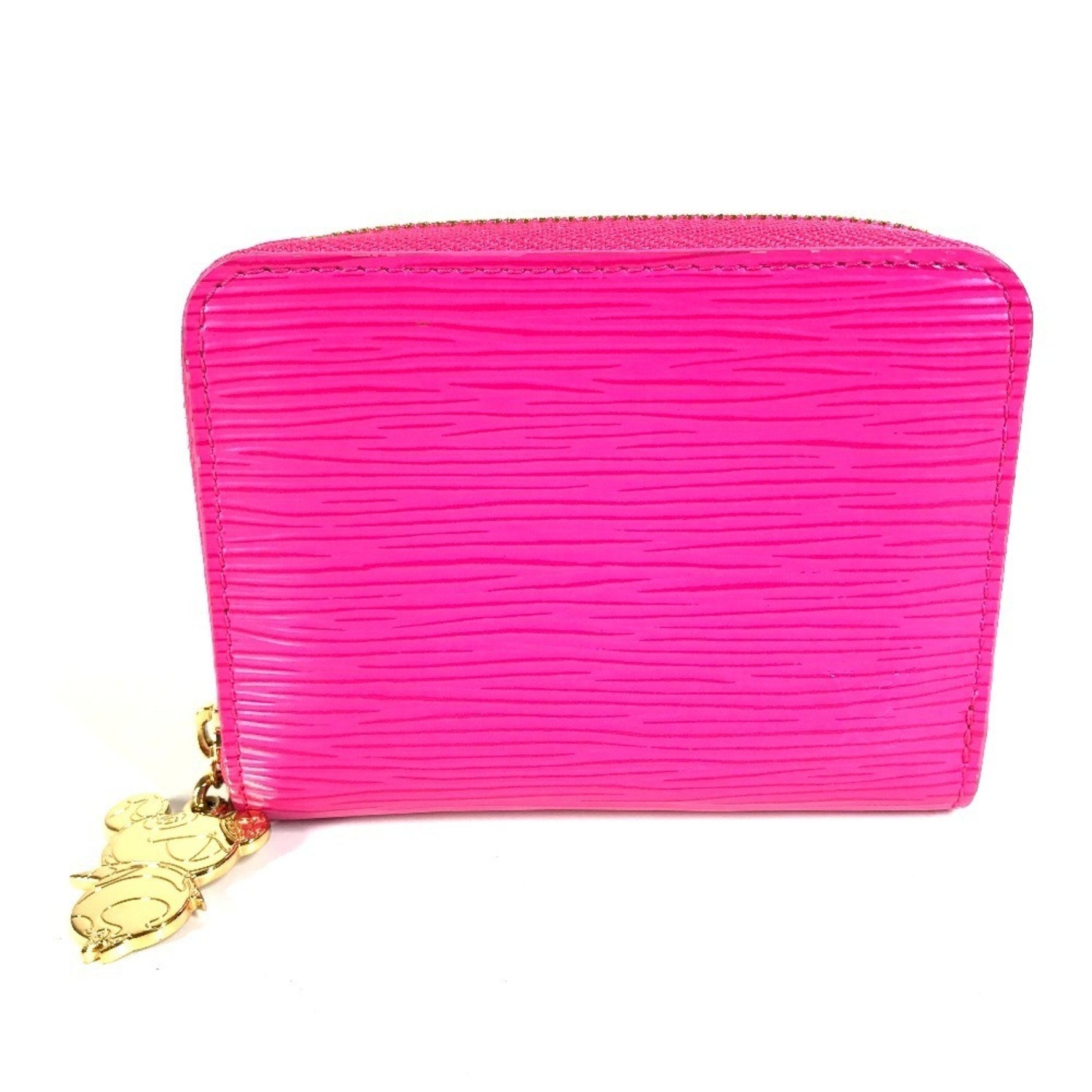 LOUIS VUITTON Japan-exclusive Epi Leather Zippy Coin Purse by Takashi Murakami. This wallet features a round zipper and is crafted from leather. It's cute design .