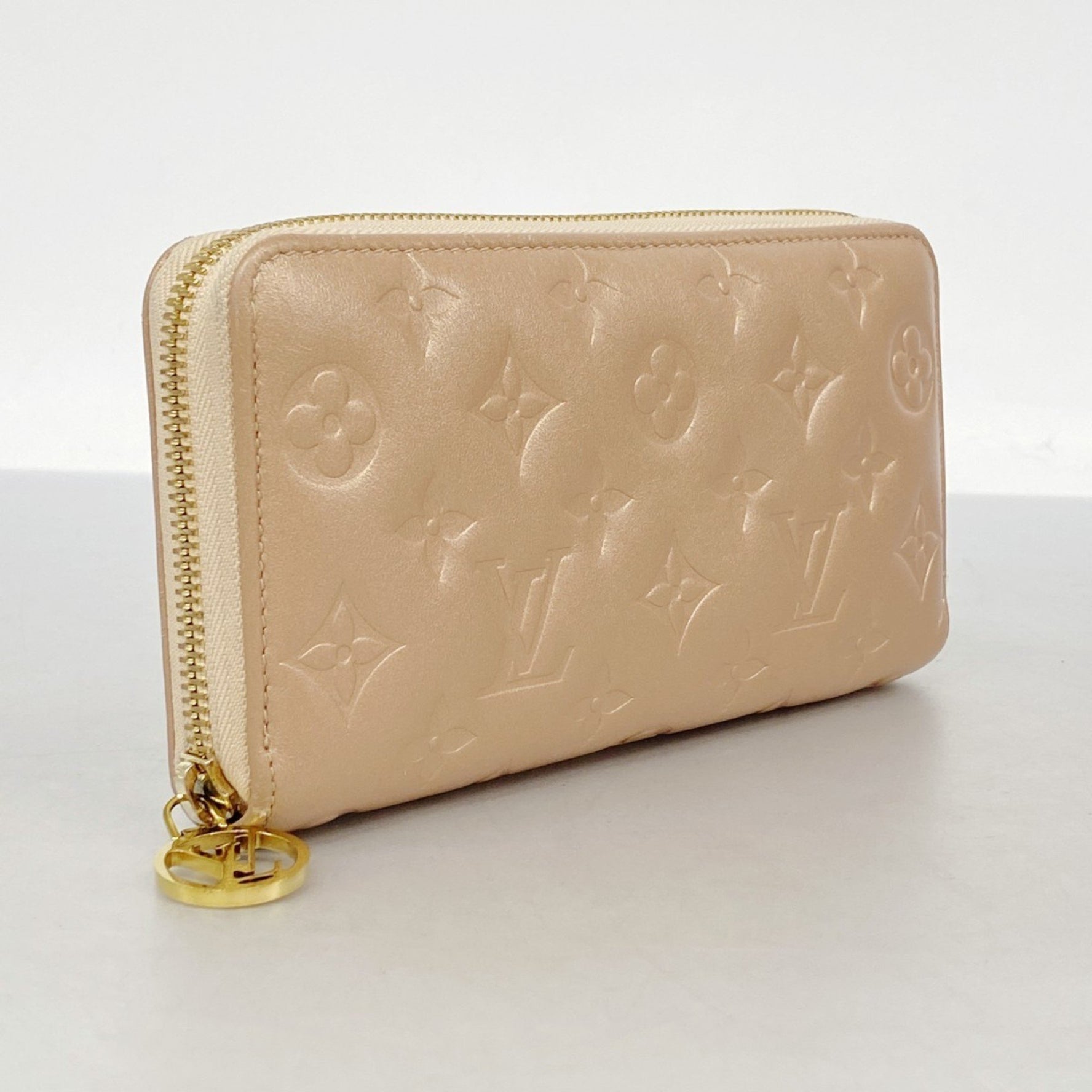 Louis Vuitton Monogram Embossed Zippy Wallet Rose Gold