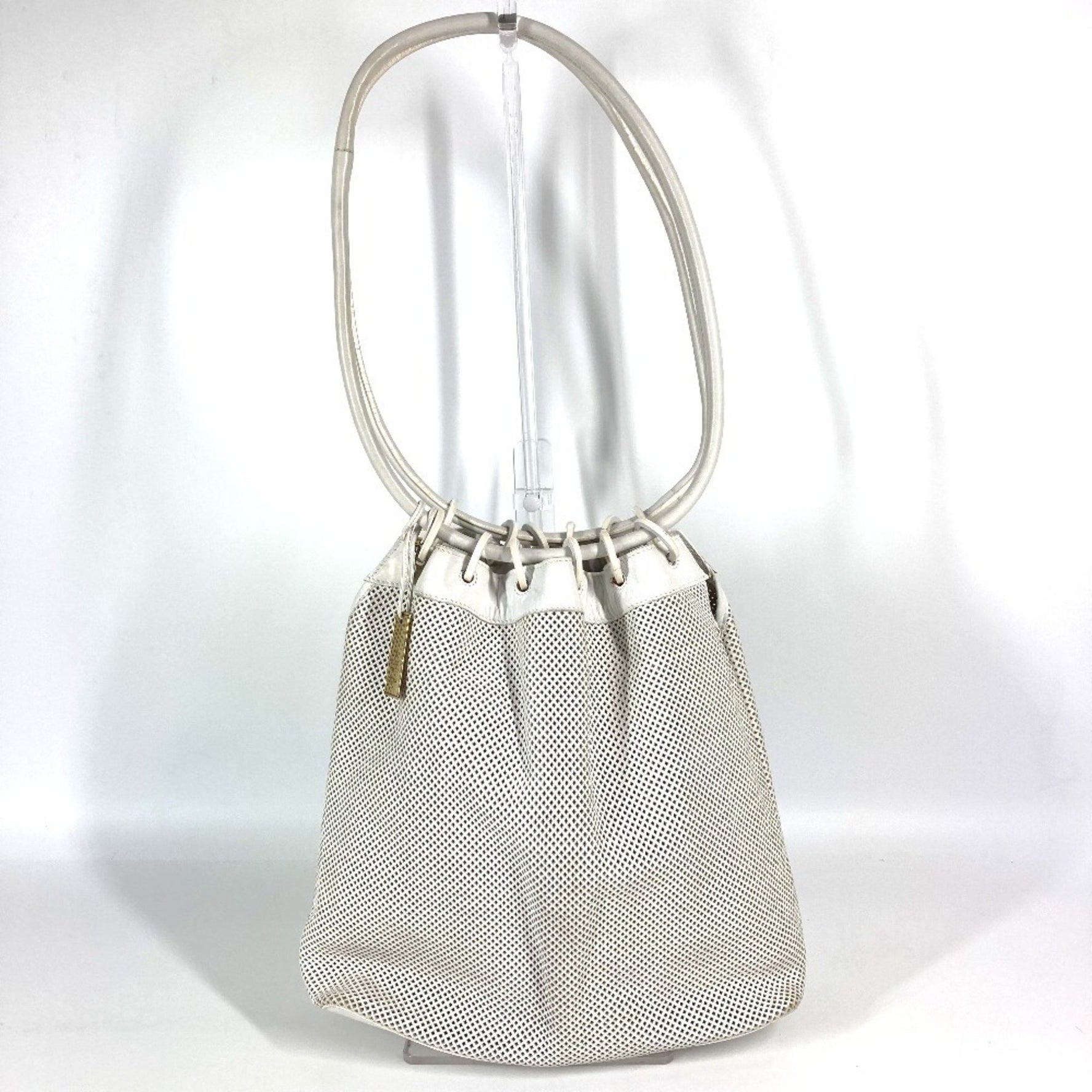GUCCI Vintage Perforated Mesh Logo Drawstring Pouch Shoulder Bag in Leather
