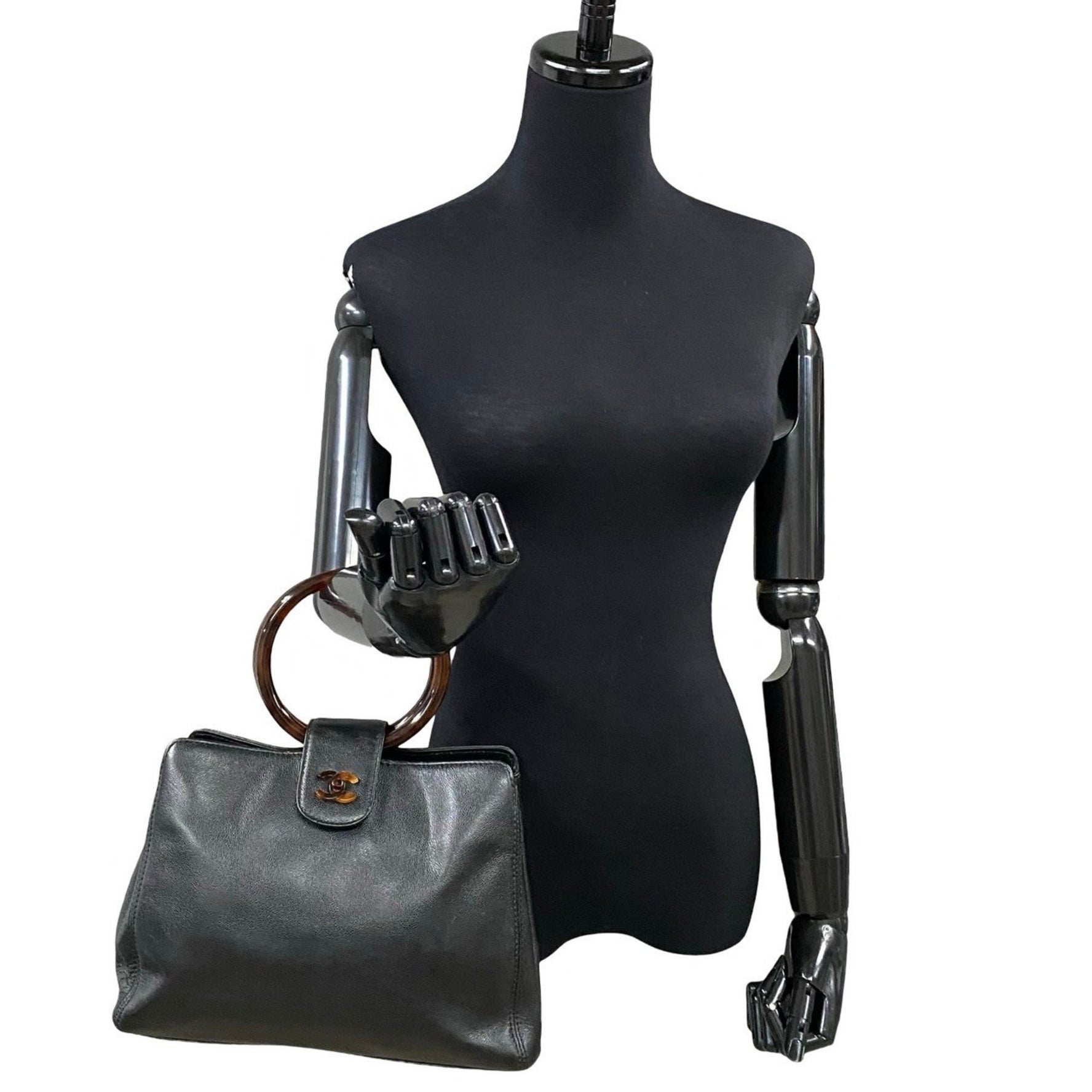 CHANEL Coco Mark Caviar Leather and Plastic Handbag