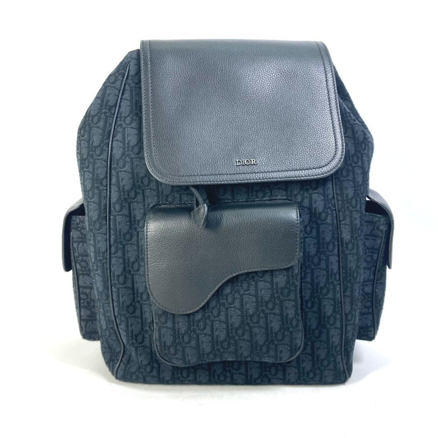 Christian Dior Dior Saddle Oblique Backpack in Navy Canvas and Leather.