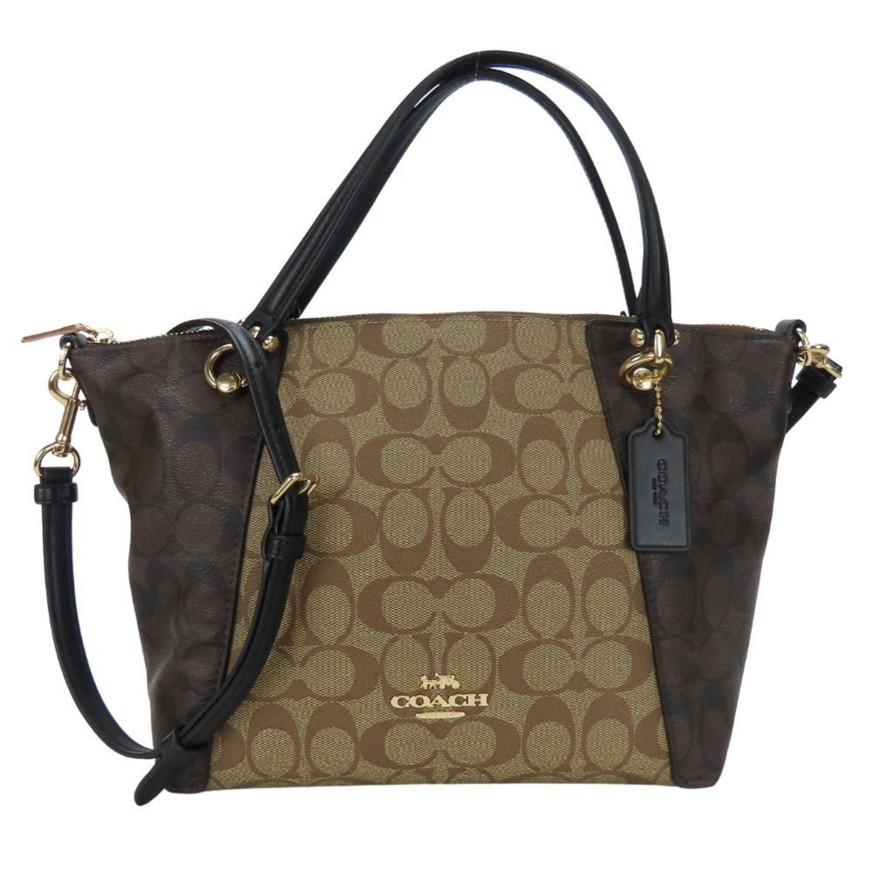 Coach handbag Signature coated canvas and leather shoulder bag in beige, brown, black.