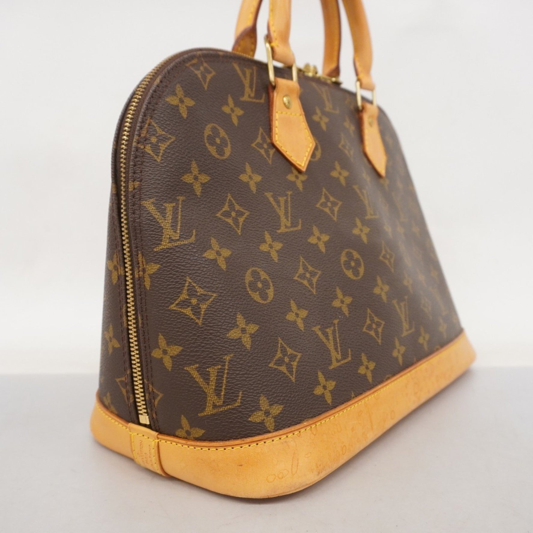 Louis Vuitton Monogram Alma Handbag