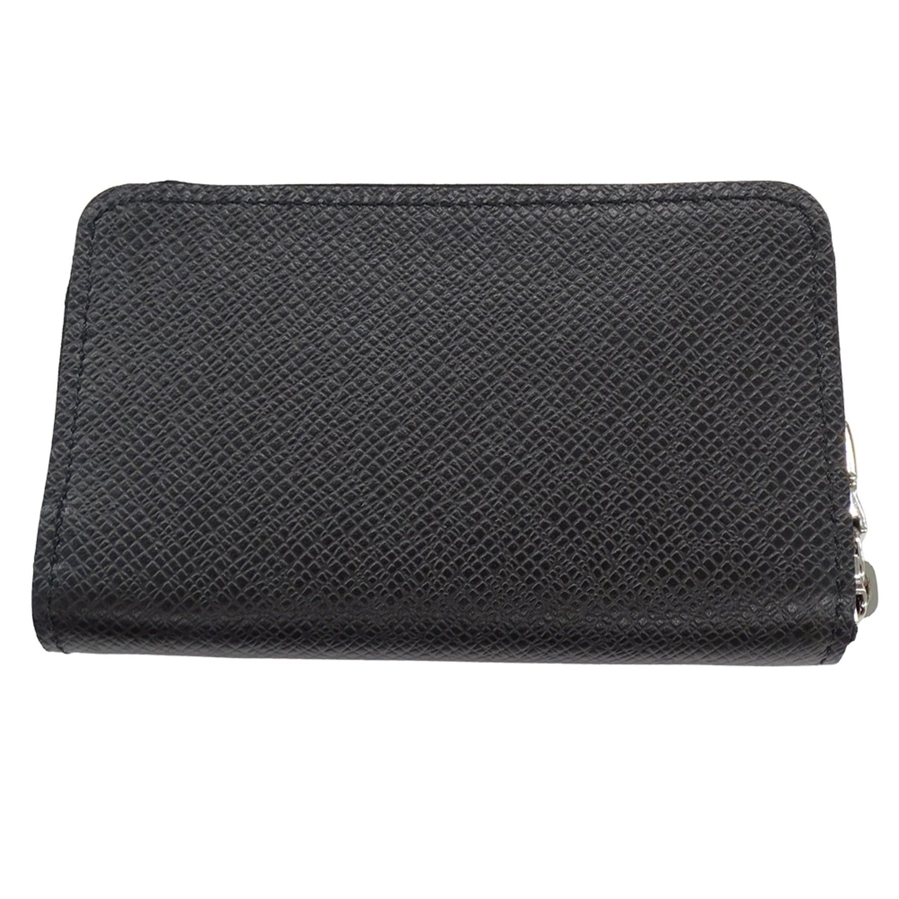 Louis Vuitton Taiga Zippy Coin Purse, with IC chip, compact design.