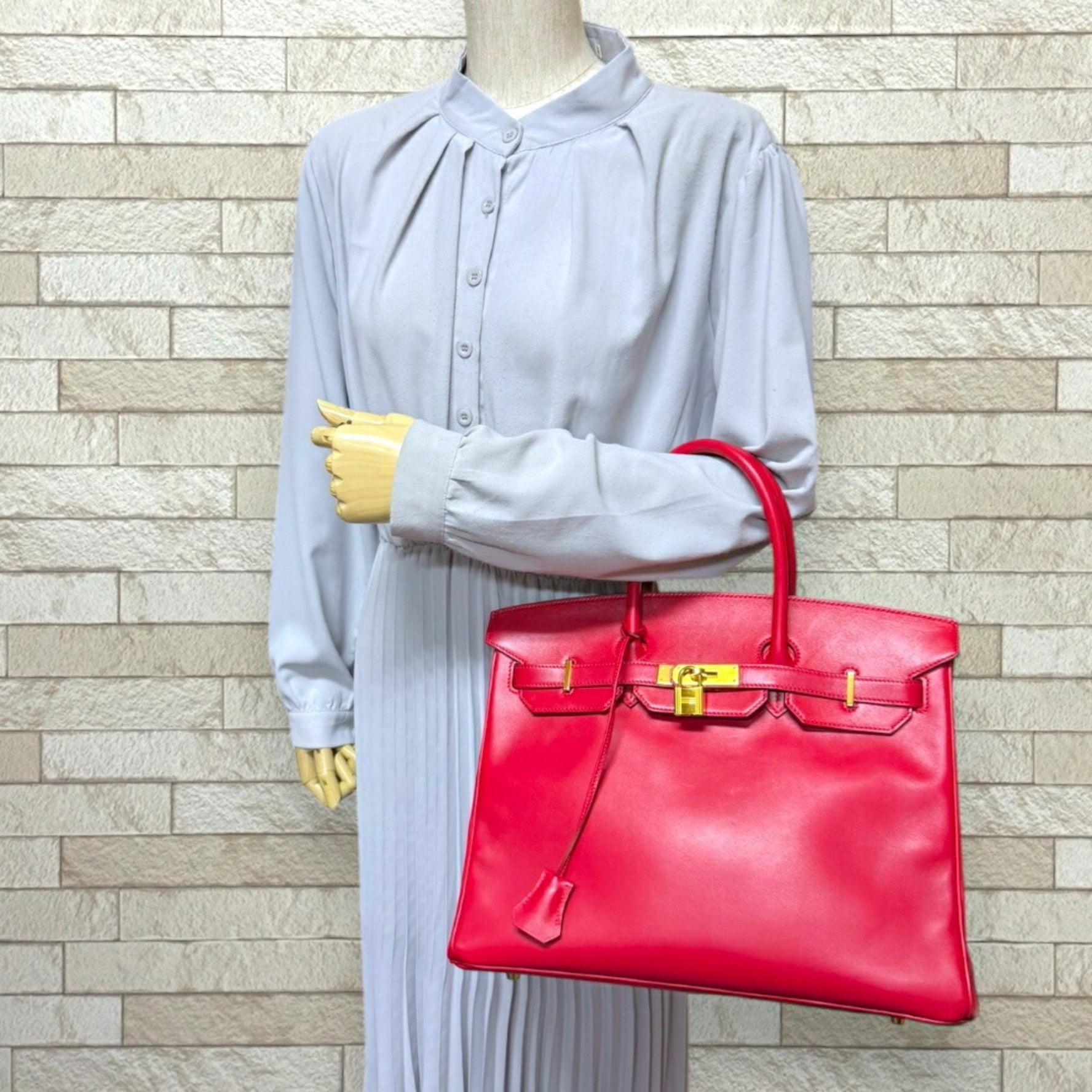 Hermes Birkin 35 handbag in Swift leather, red, for women.