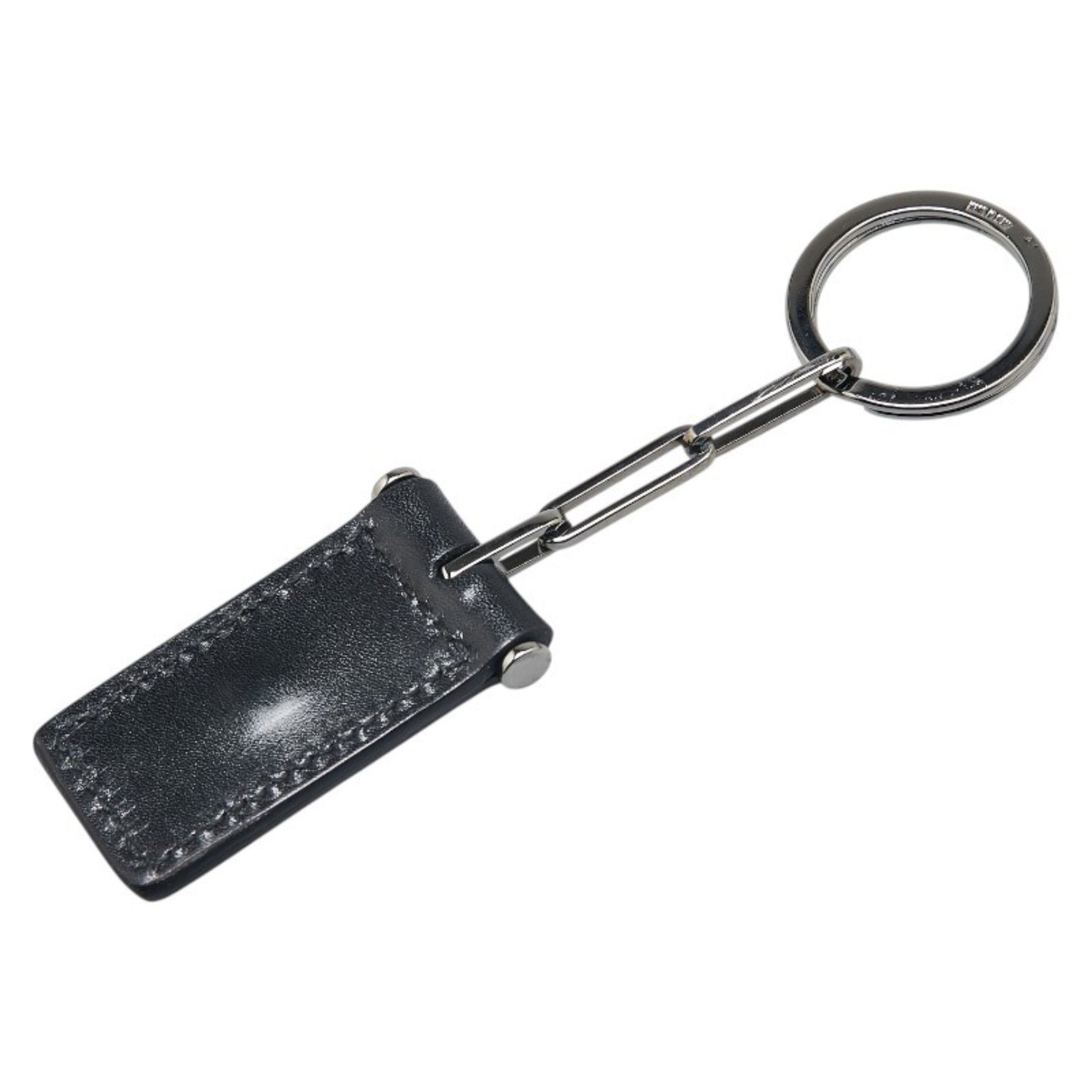 Gucci bag charm keychain in with silver hardware and leather.