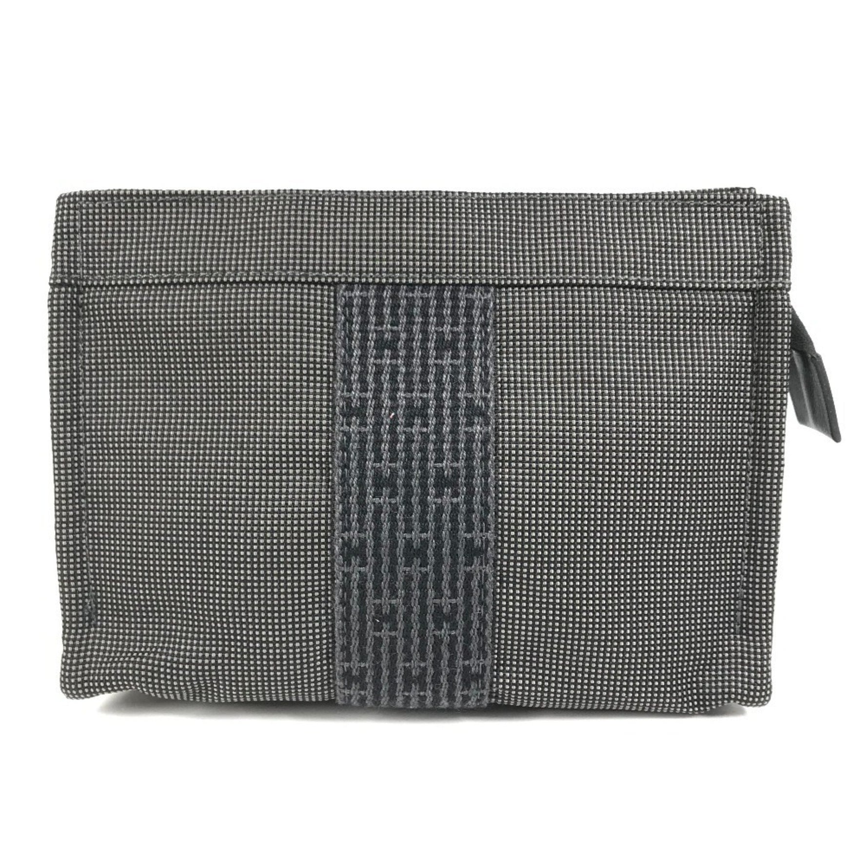 HERMES Air Line Pouch PM, a versatile pouch perfect for clutches, second bags, and more. Made of canvas, this is available in men women.