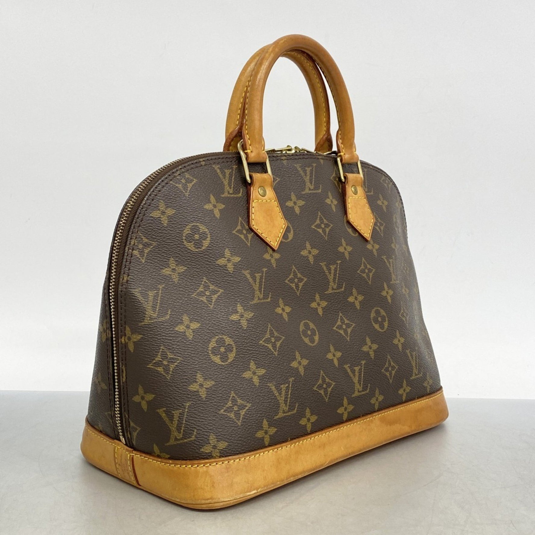 Louis Vuitton Monogram Alma Handbag