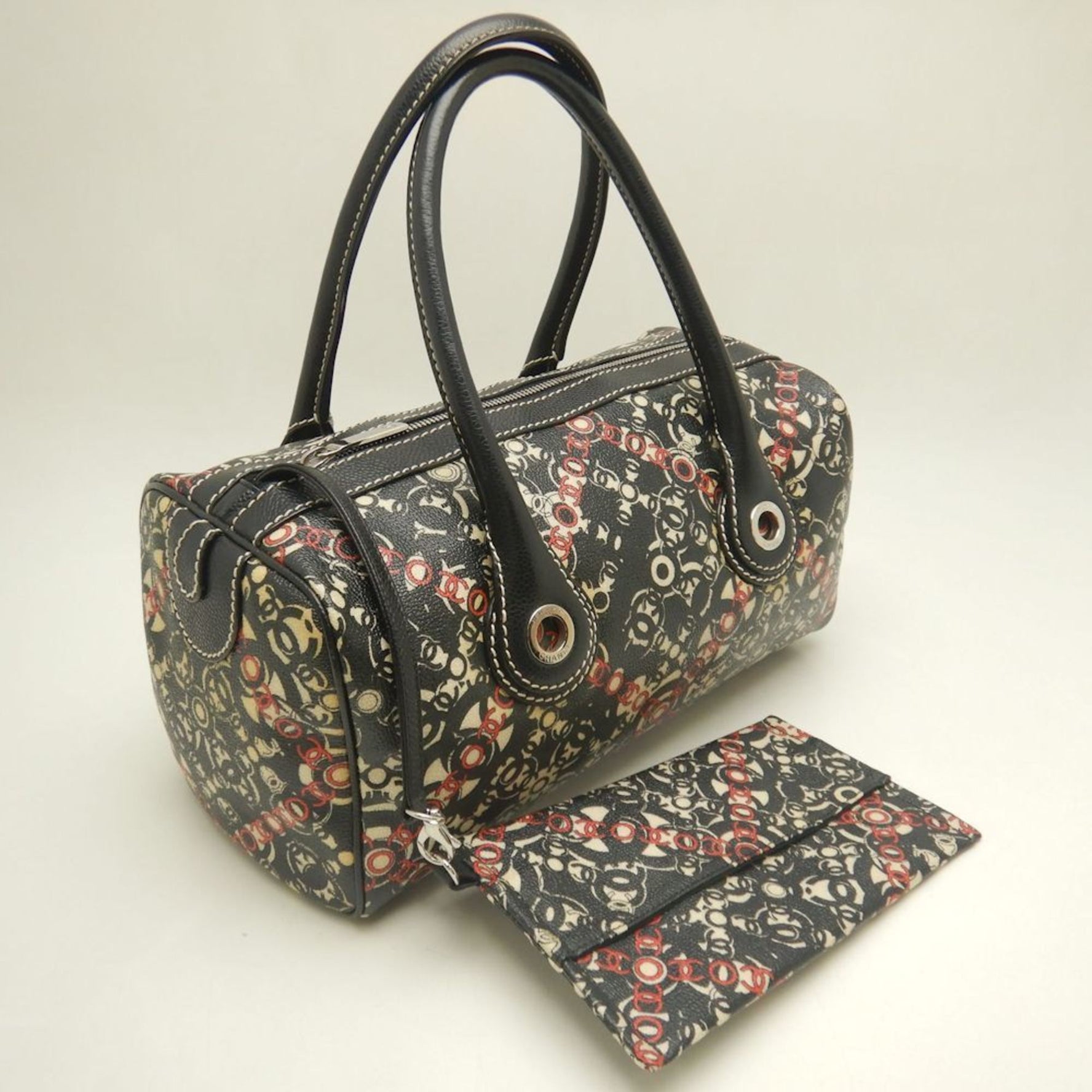 CHANEL Coco Travel Boston Bag in Black and Red Caviar Leather