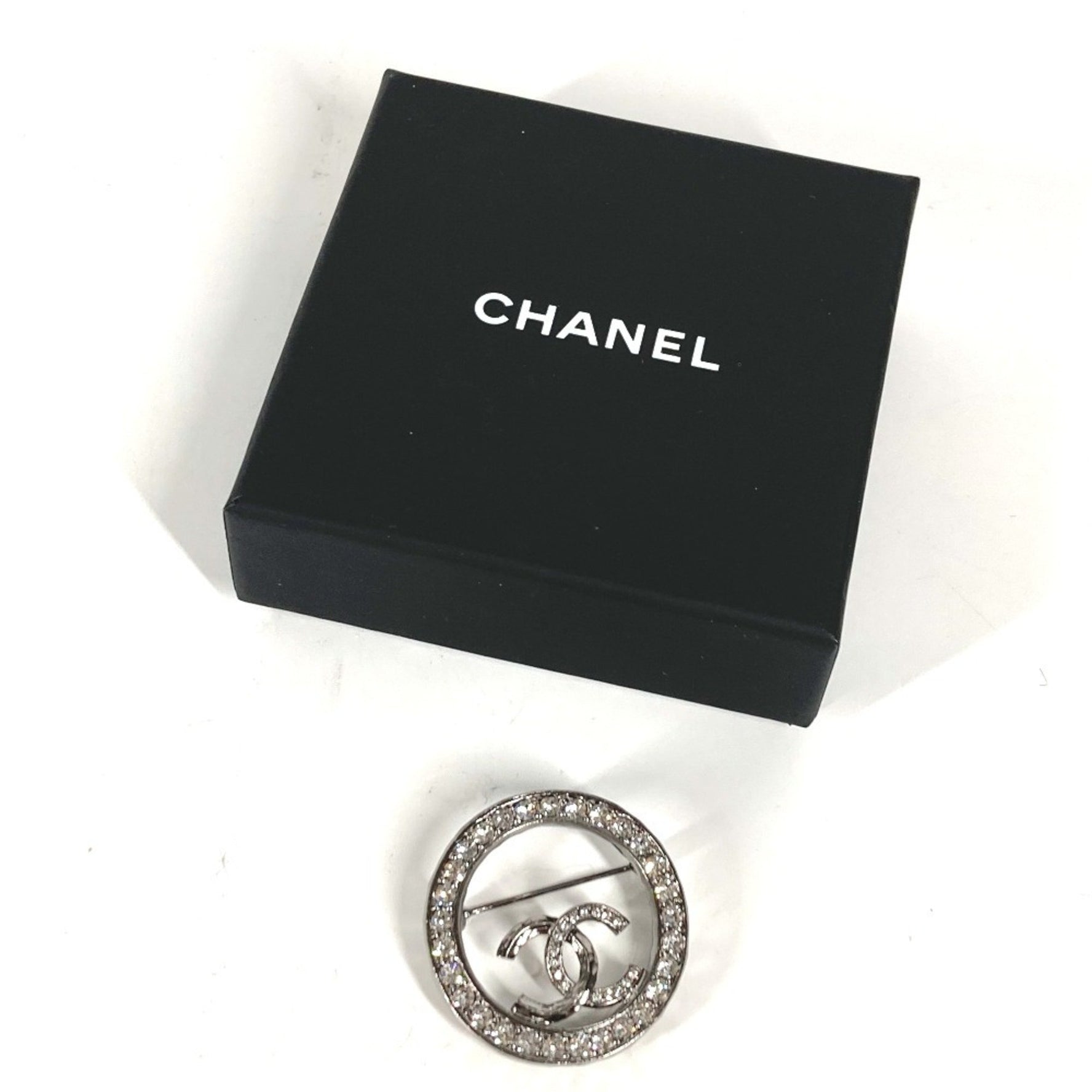 CHANEL 21K CC Coco Mark Round Rhinestone Brooch in Silver, Like New