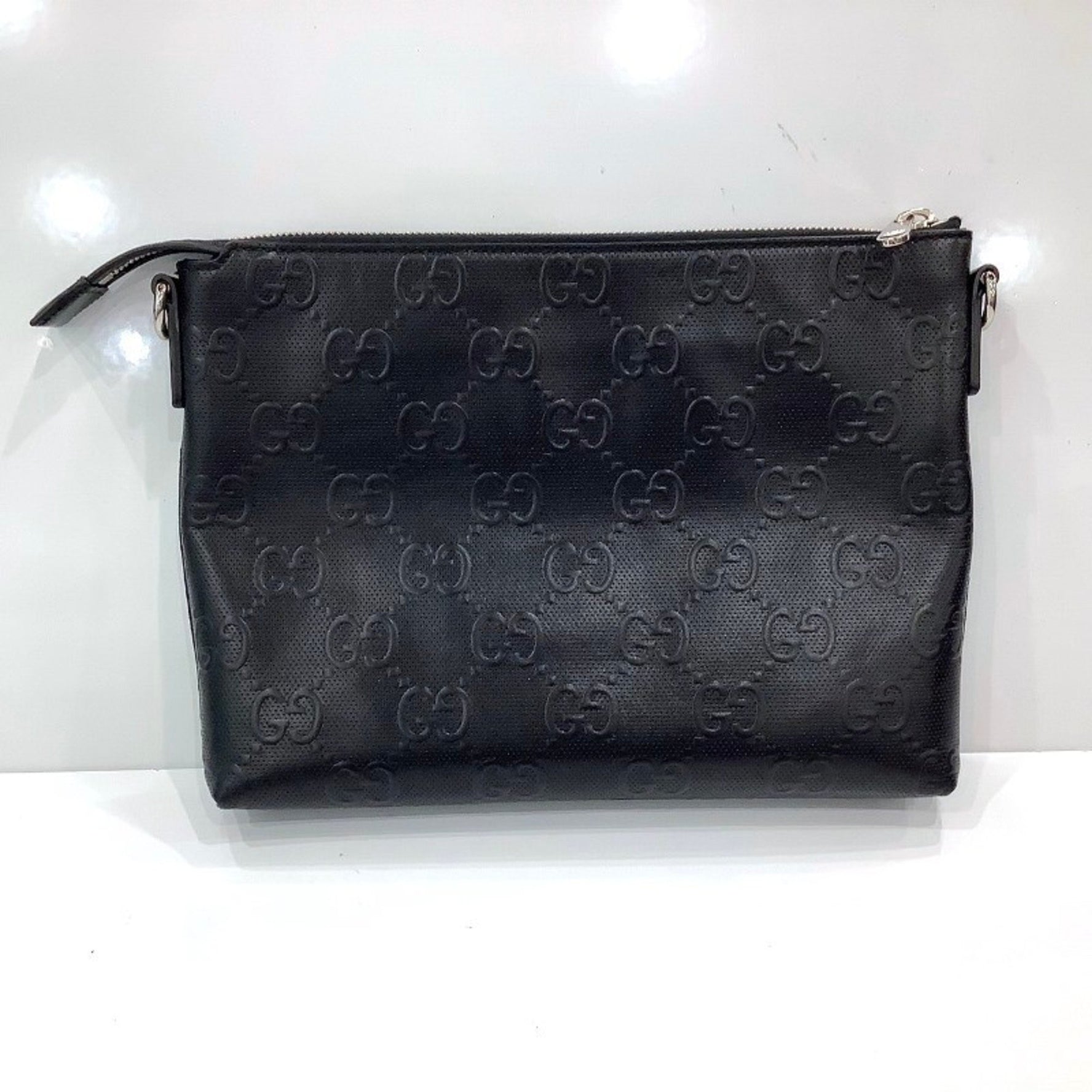 GUCCI GG Embossed Medium Clutch Bag