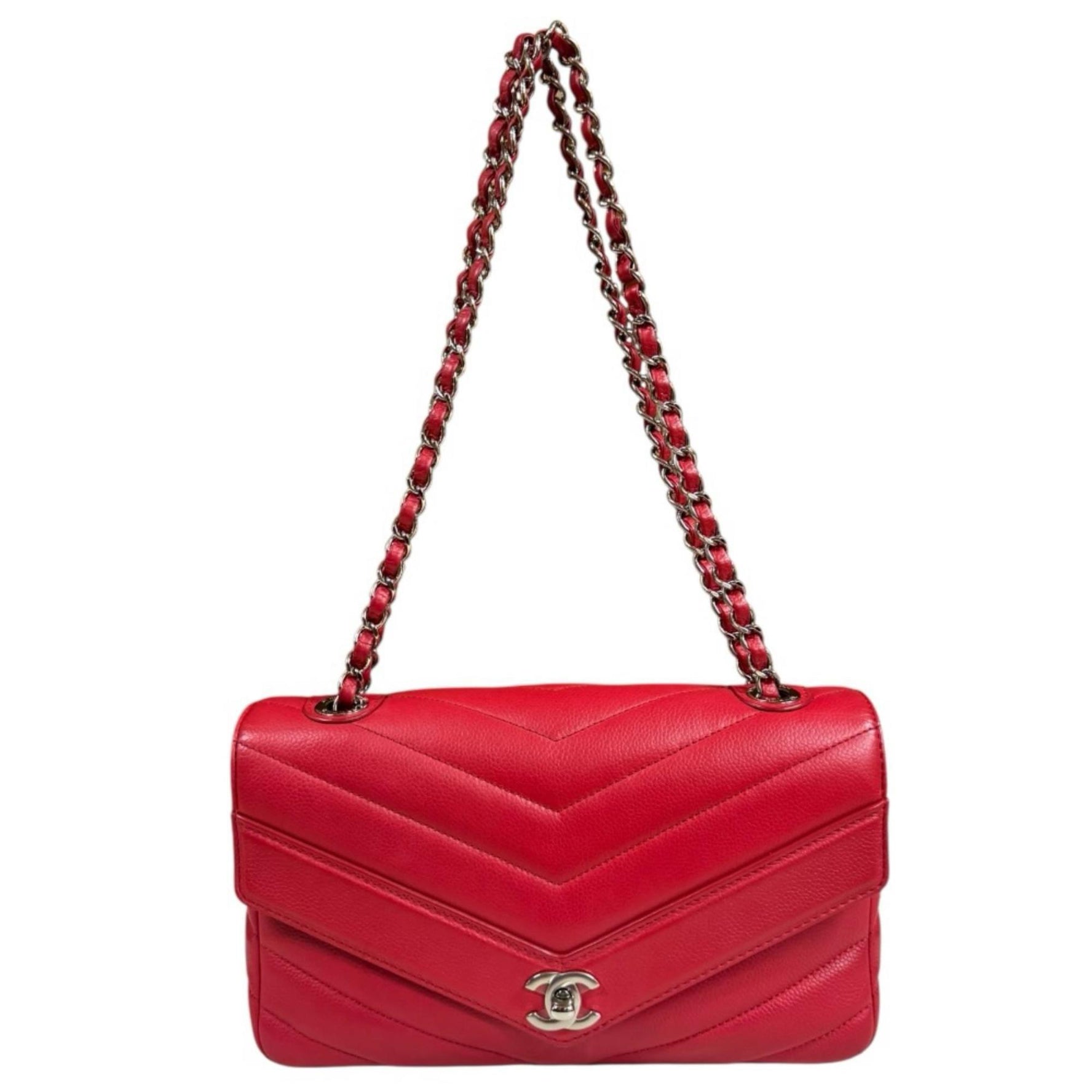 Chanel V-stitch shoulder bag in red leather with a double chain.
