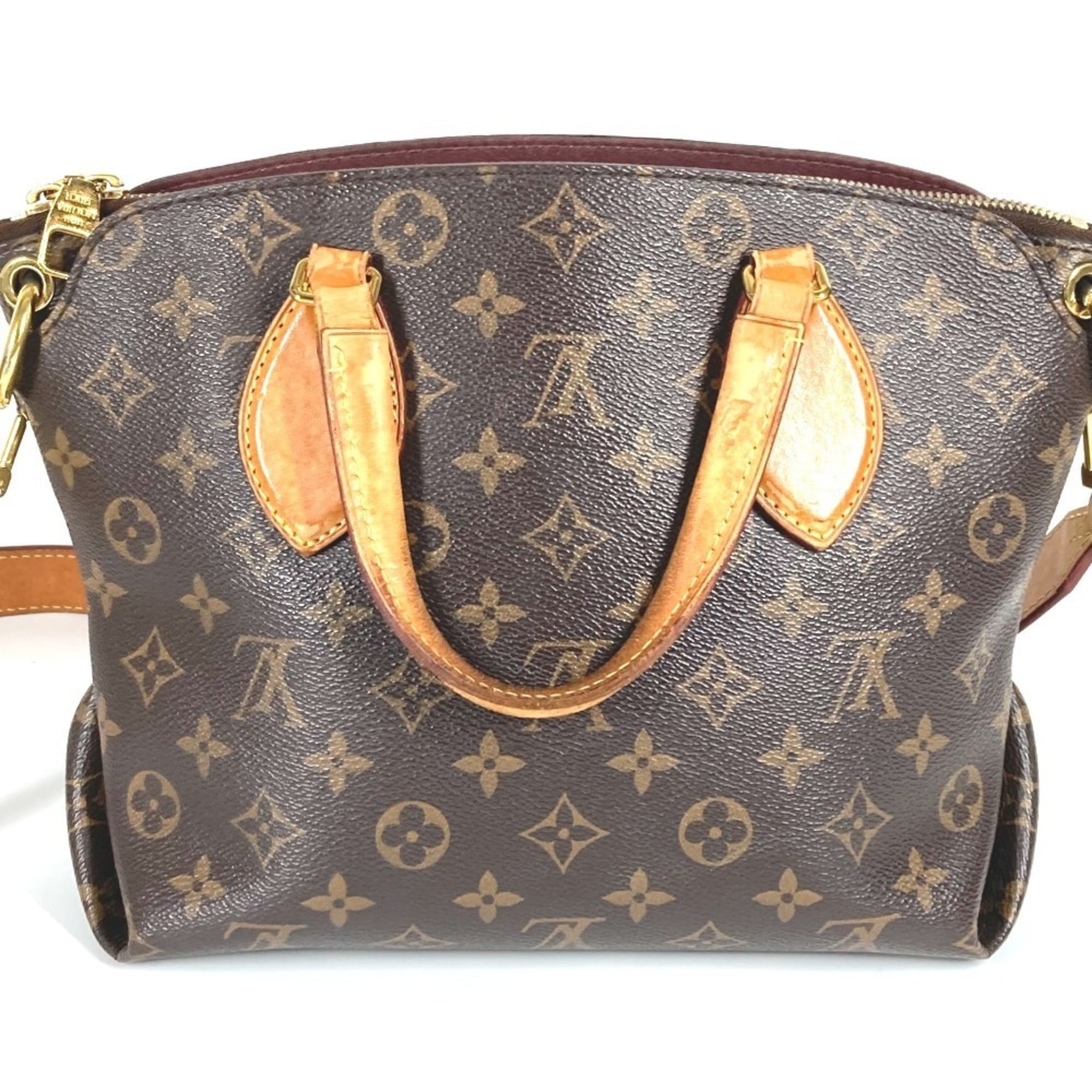 LOUIS VUITTON Monogram Flower Zipped Tote PM a bag that can be used as shoulder or handbag. Available in canvas and women.