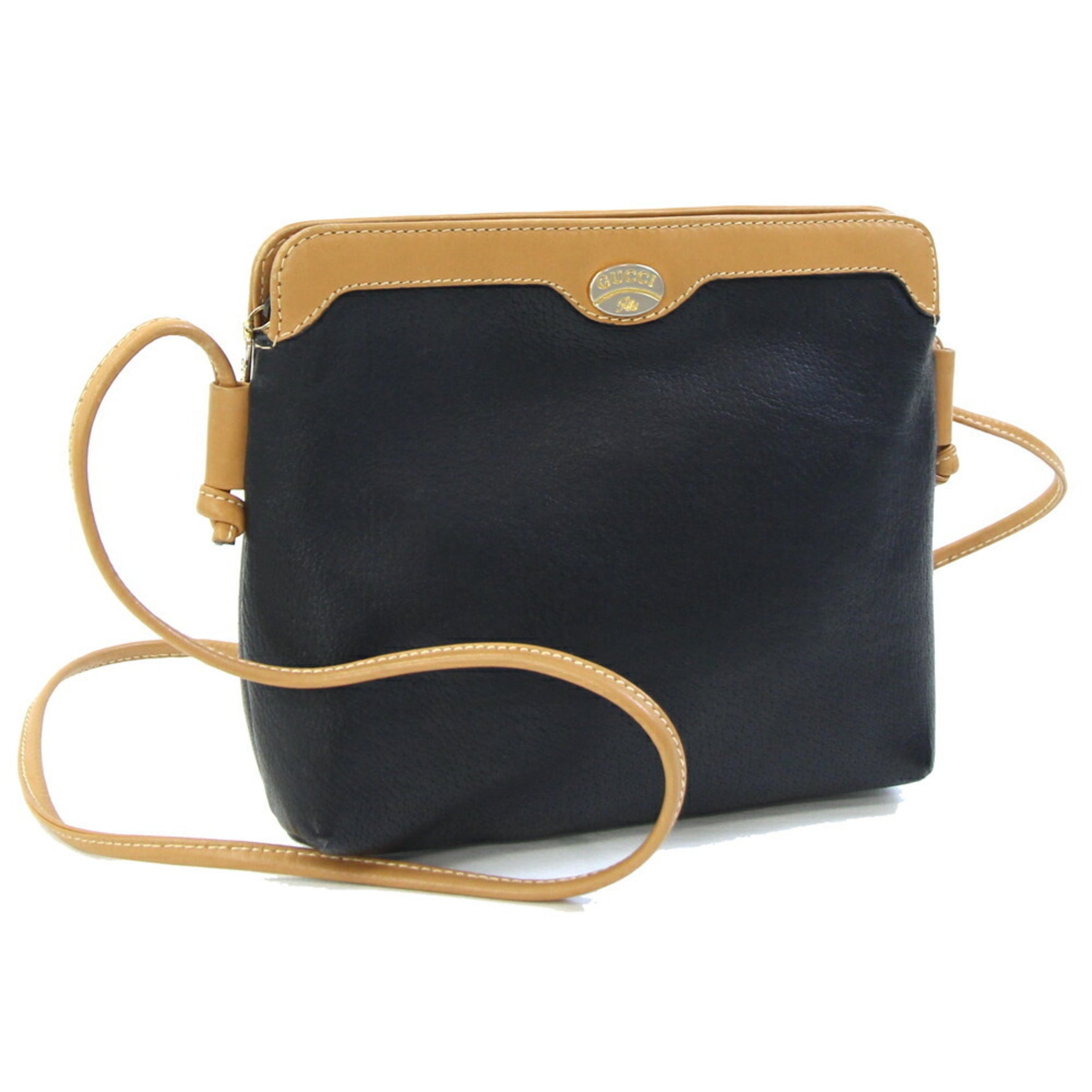 Gucci shoulder bag in black and light brown leather. This is a bag.