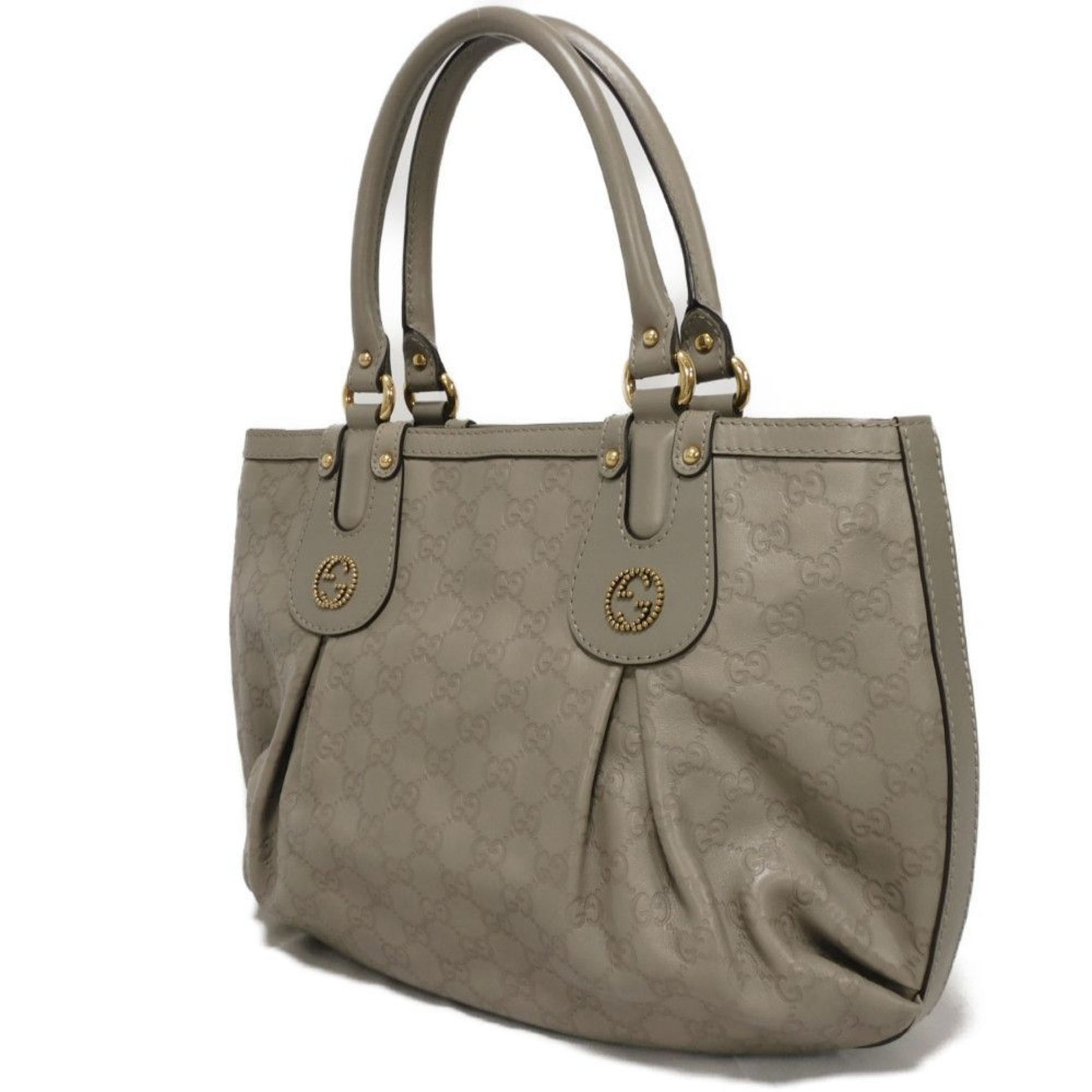 Gucci tote bag in scarlet with double G embossed calf leather, interlocking studs, and GG sima .