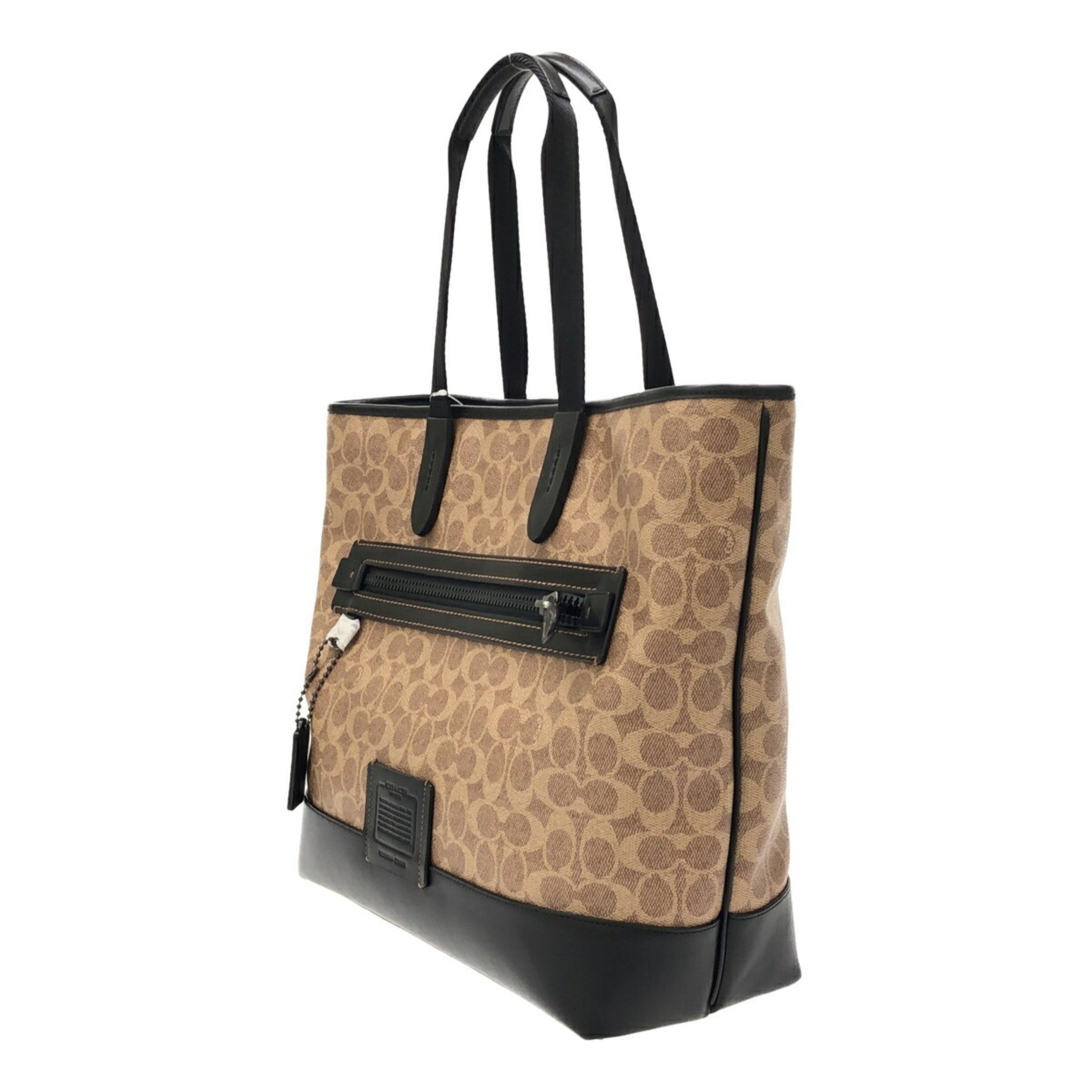 COACH Academy Tote Bag in Signature Canvas (73665) - Made with leather and cowhide leather. Fits laptop. Unused. Available at Mikunigaoka store.