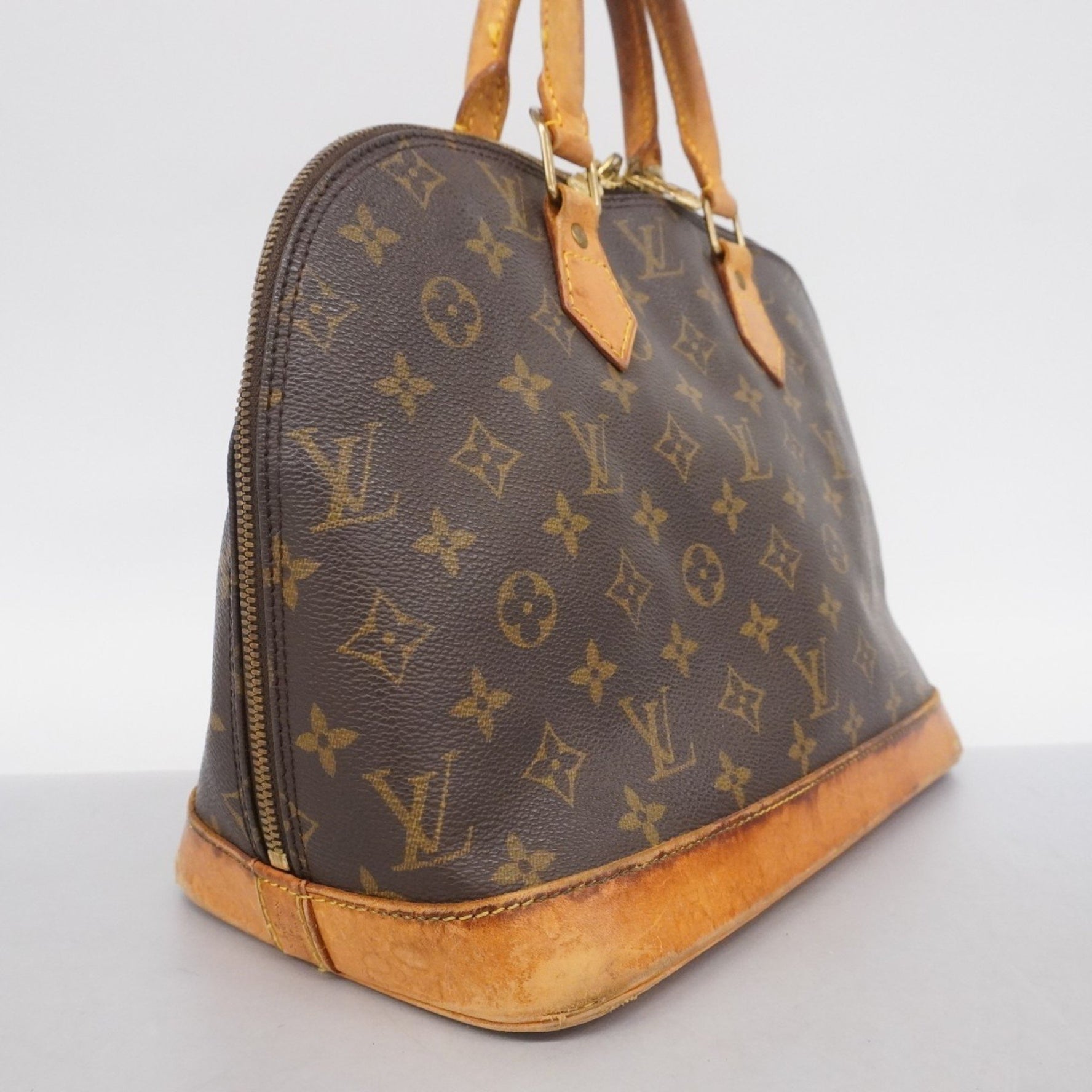 Louis Vuitton Monogram Alma Handbag