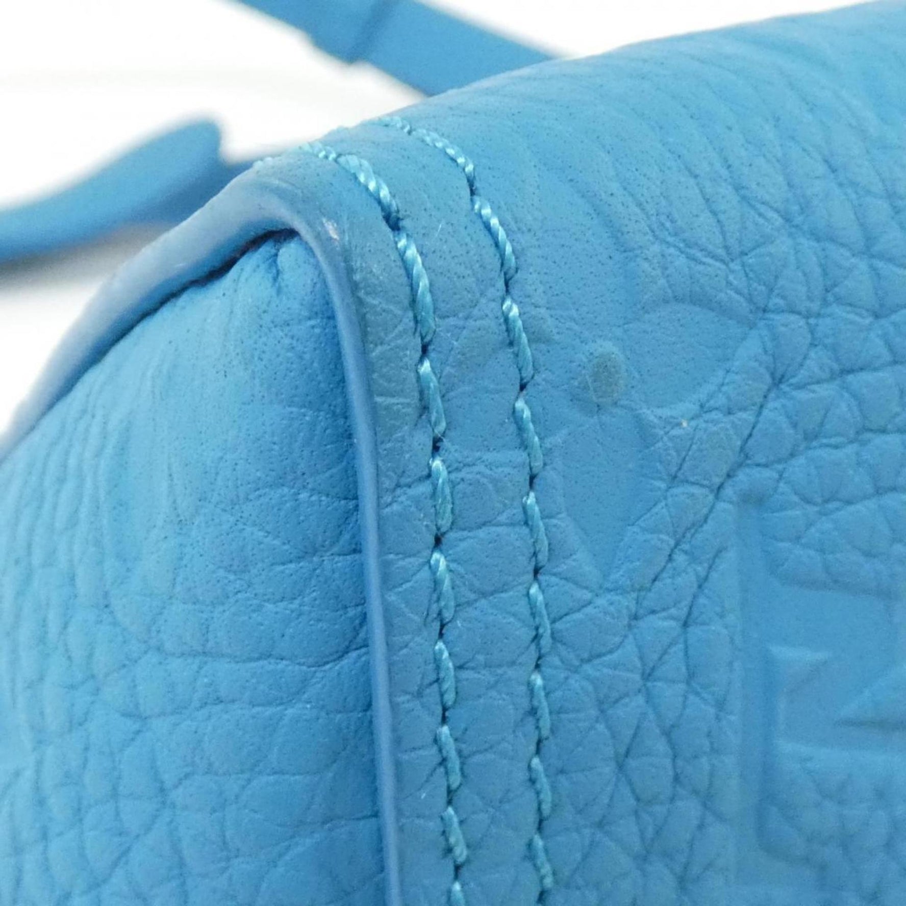 Louis Vuitton Taurillon Monogram Triangle Messenger Shoulder Bag