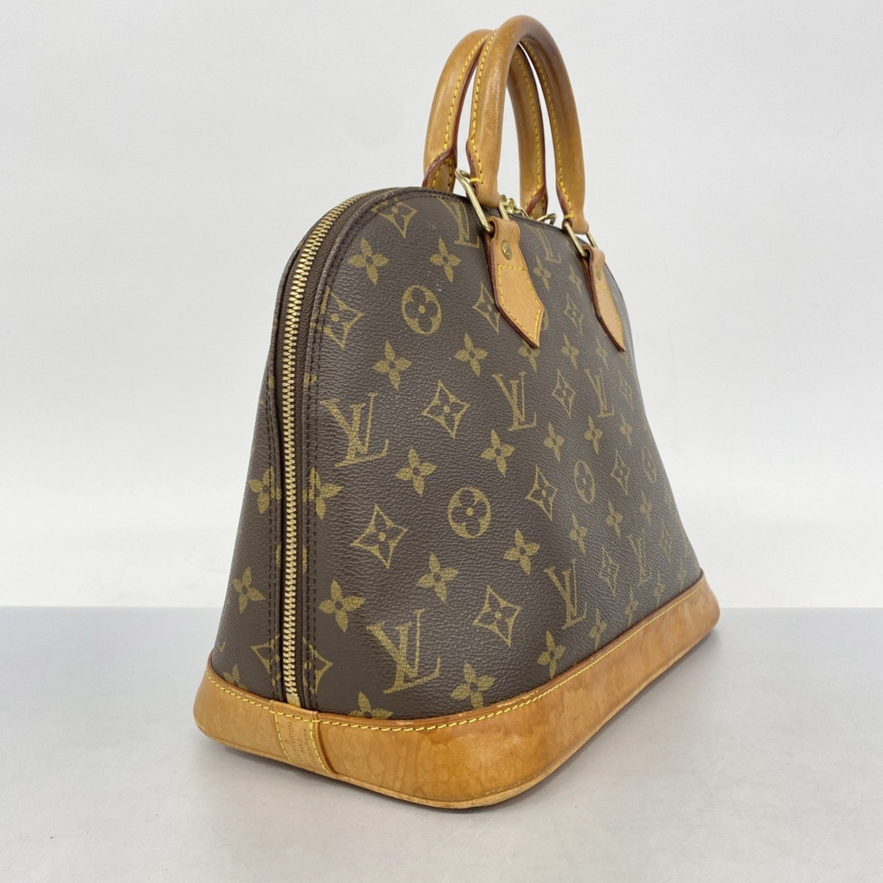 Louis Vuitton Monogram Alma Handbag
