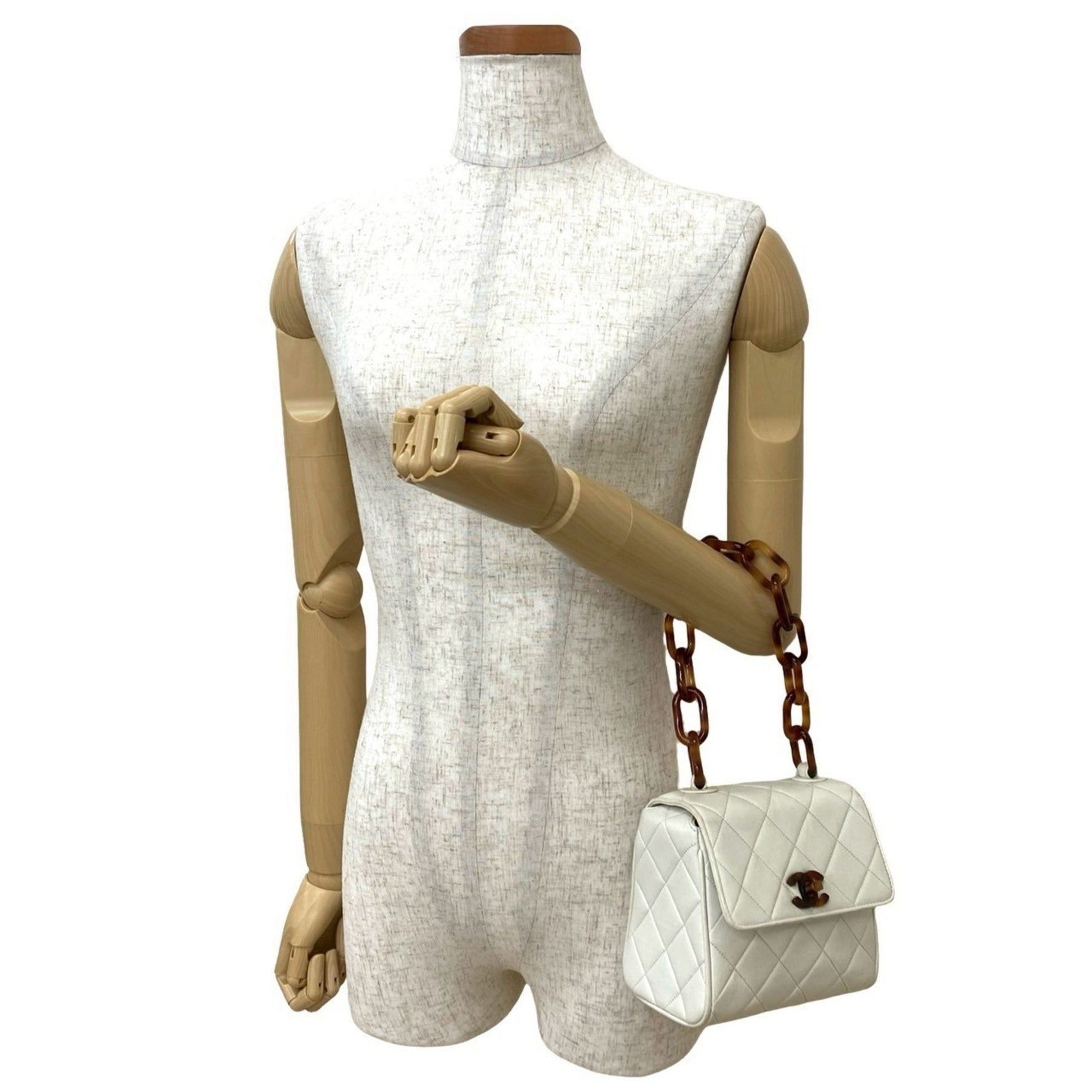 CHANEL Matelasse Coco Mark Lambskin Chain Mini Handbag in White and Brown