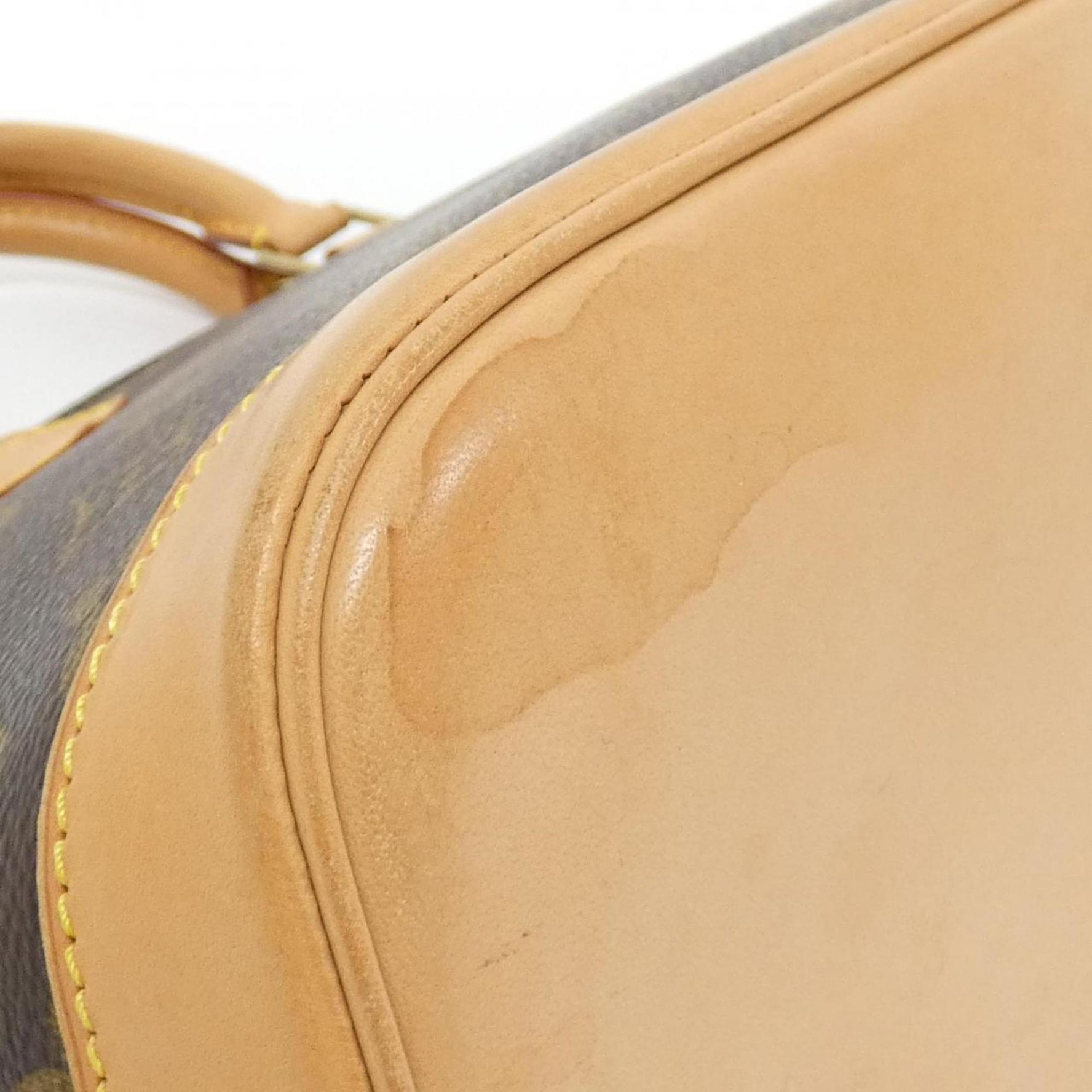 Louis Vuitton Monogram Alma PM Handbag