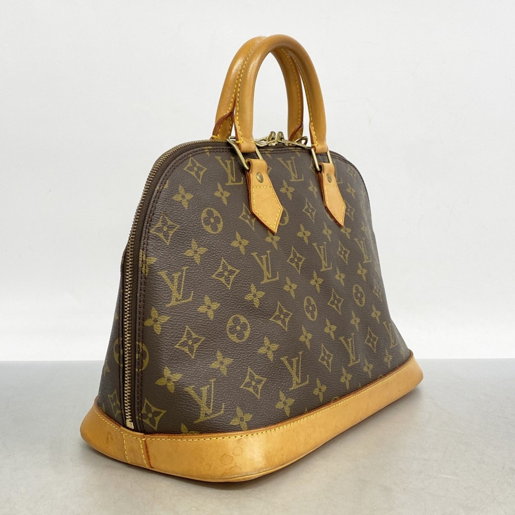 Louis Vuitton Monogram Alma Handbag