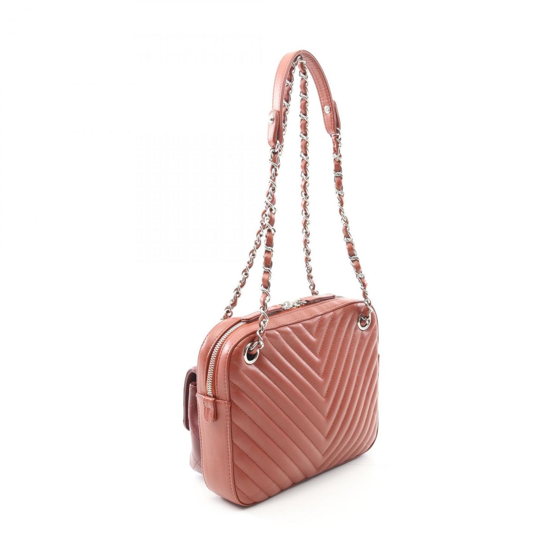 Chanel V-stitch chevron shoulder bag in lambskin leather, available brown and burgundy tones.