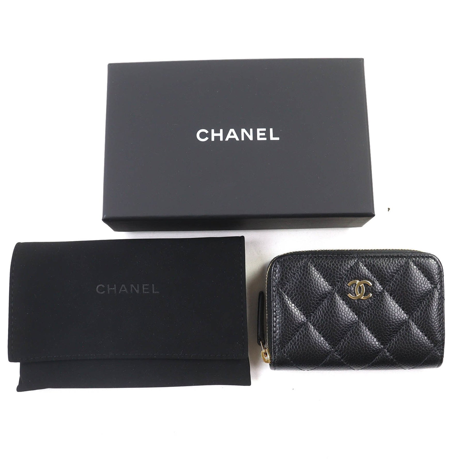 CHANEL Classic Coin Purse in Caviar Leather with Coco Mark and Random Serial Number. Zip-Up Wallet/Coin Case Gold Hardware. Includes Box Dust Bag. Made Italy.