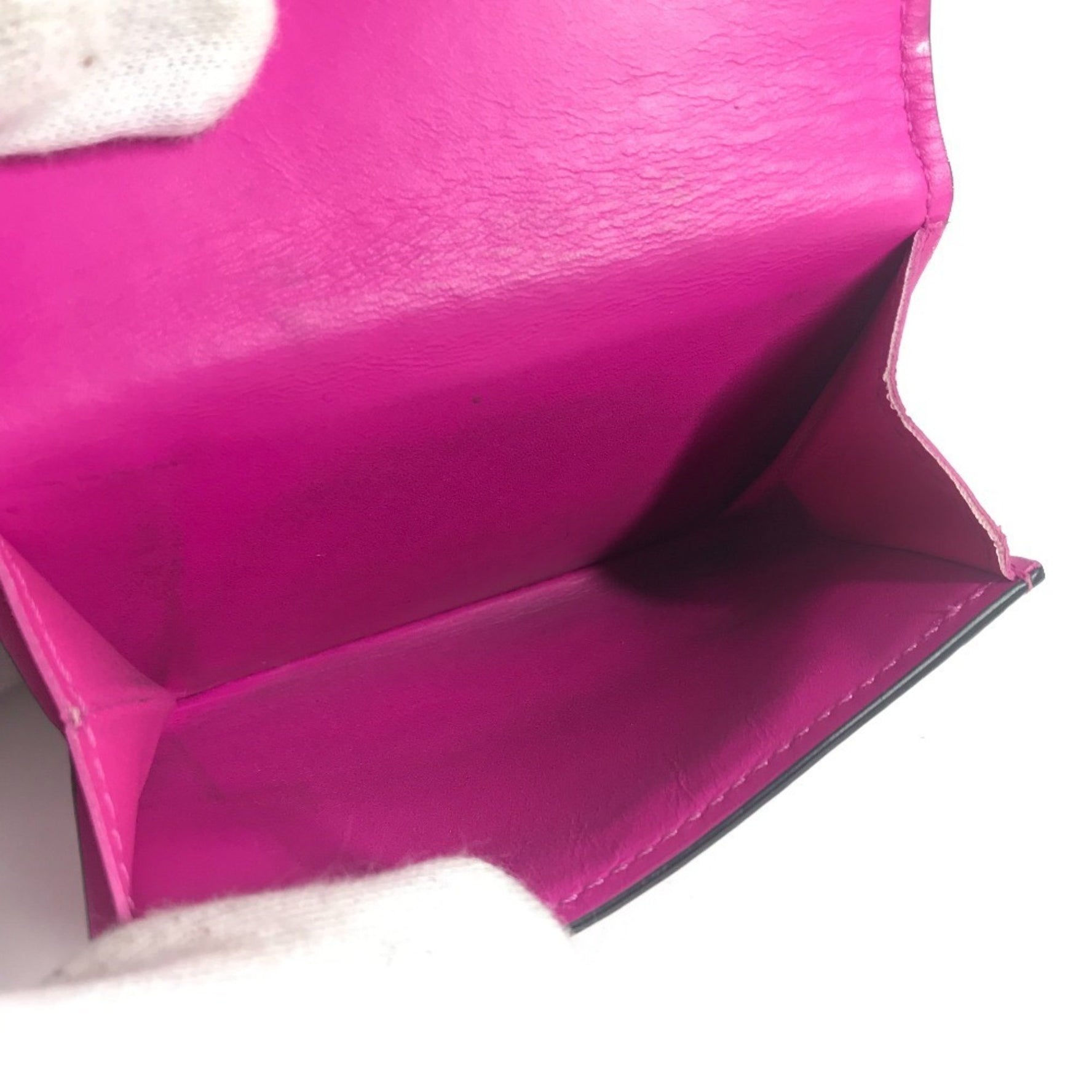 LOUIS VUITTON Taiga Rama Discovery Compact Wallet, a tri-fold wallet in leather and Monogram canvas, available women.