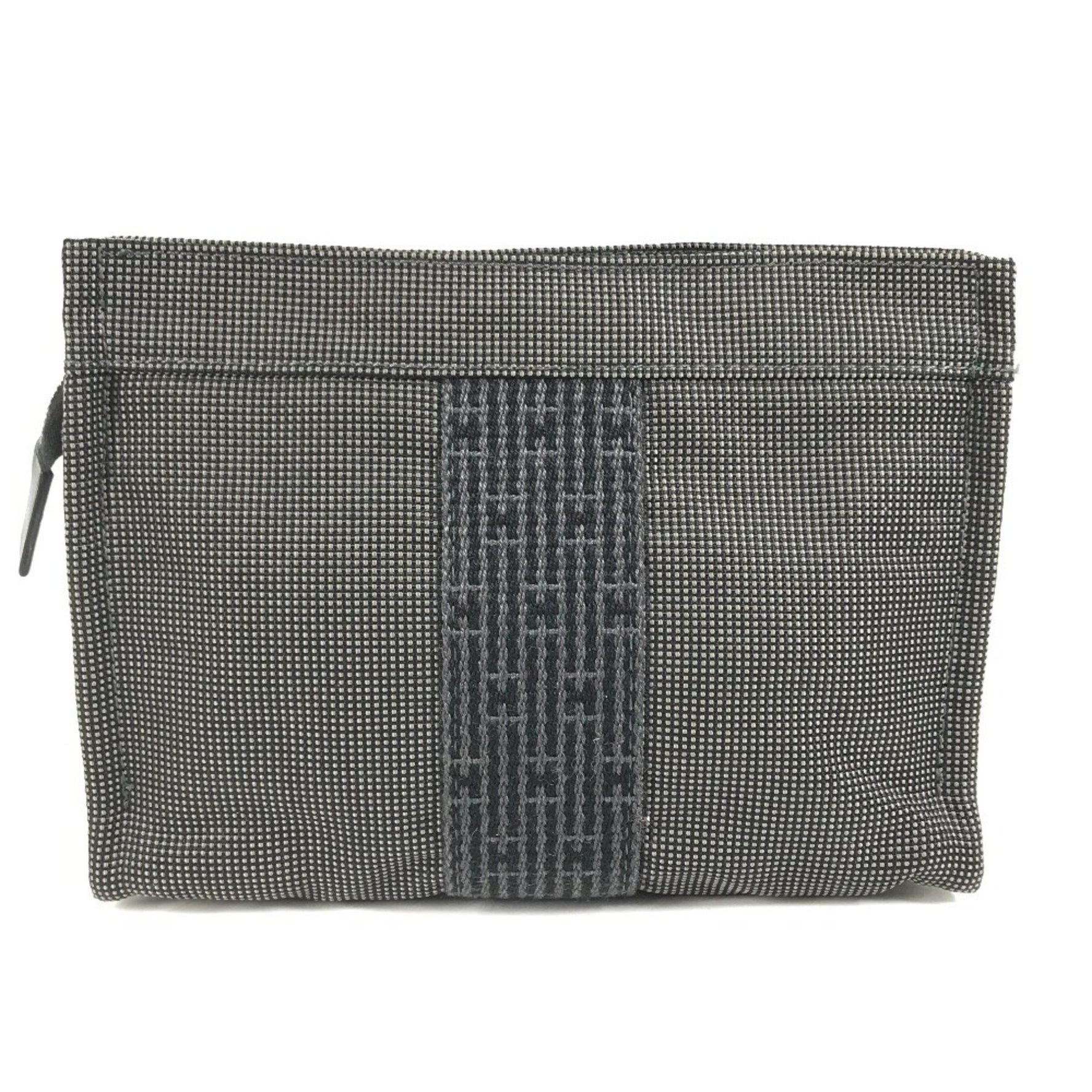 HERMES Air Line Pouch PM, a versatile pouch perfect for clutches, second bags, and more. Made of canvas, this is available in men women.