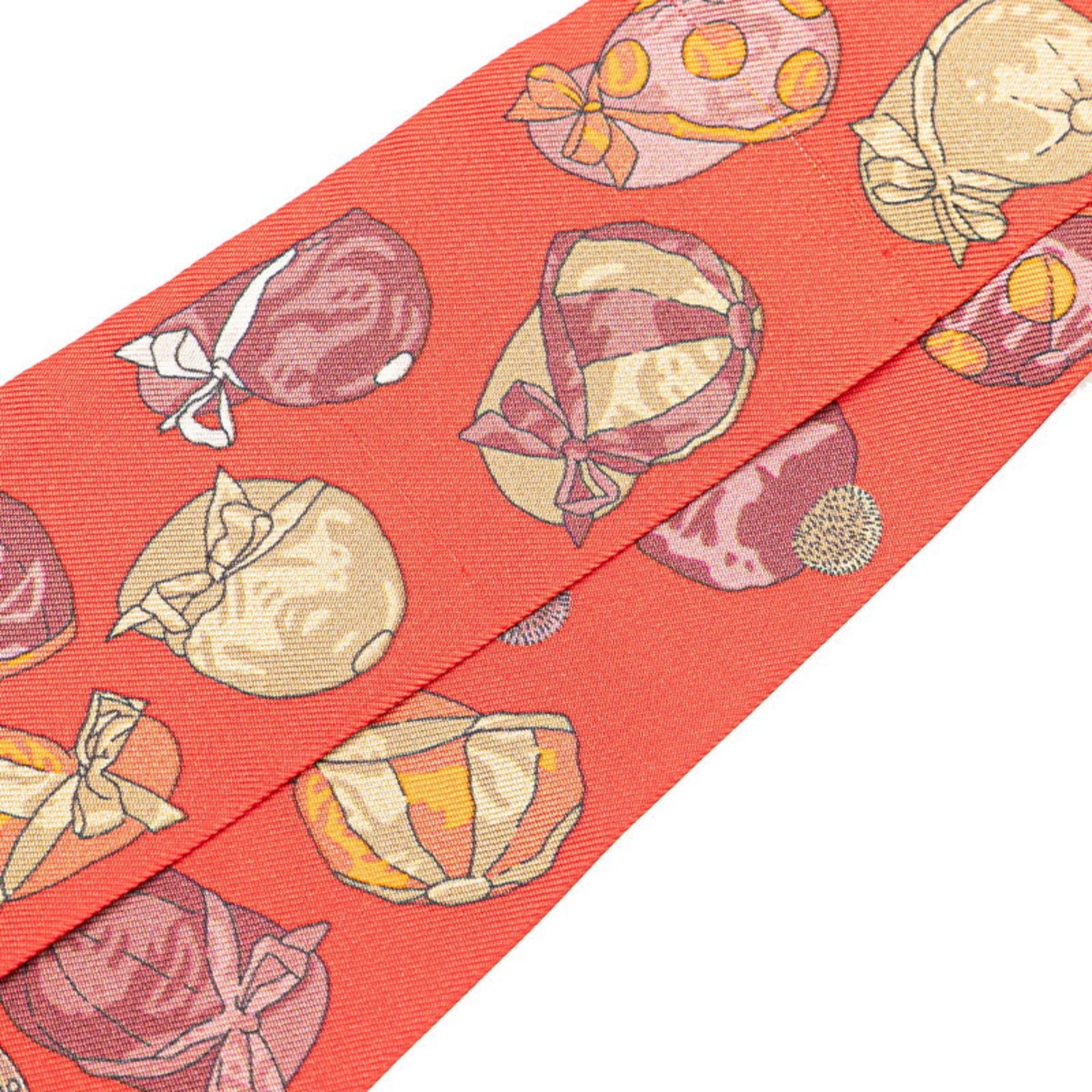 Hermes Hermès Twilly JOCKEY equestrian hat motif scarf/muffler in red and orange silk .