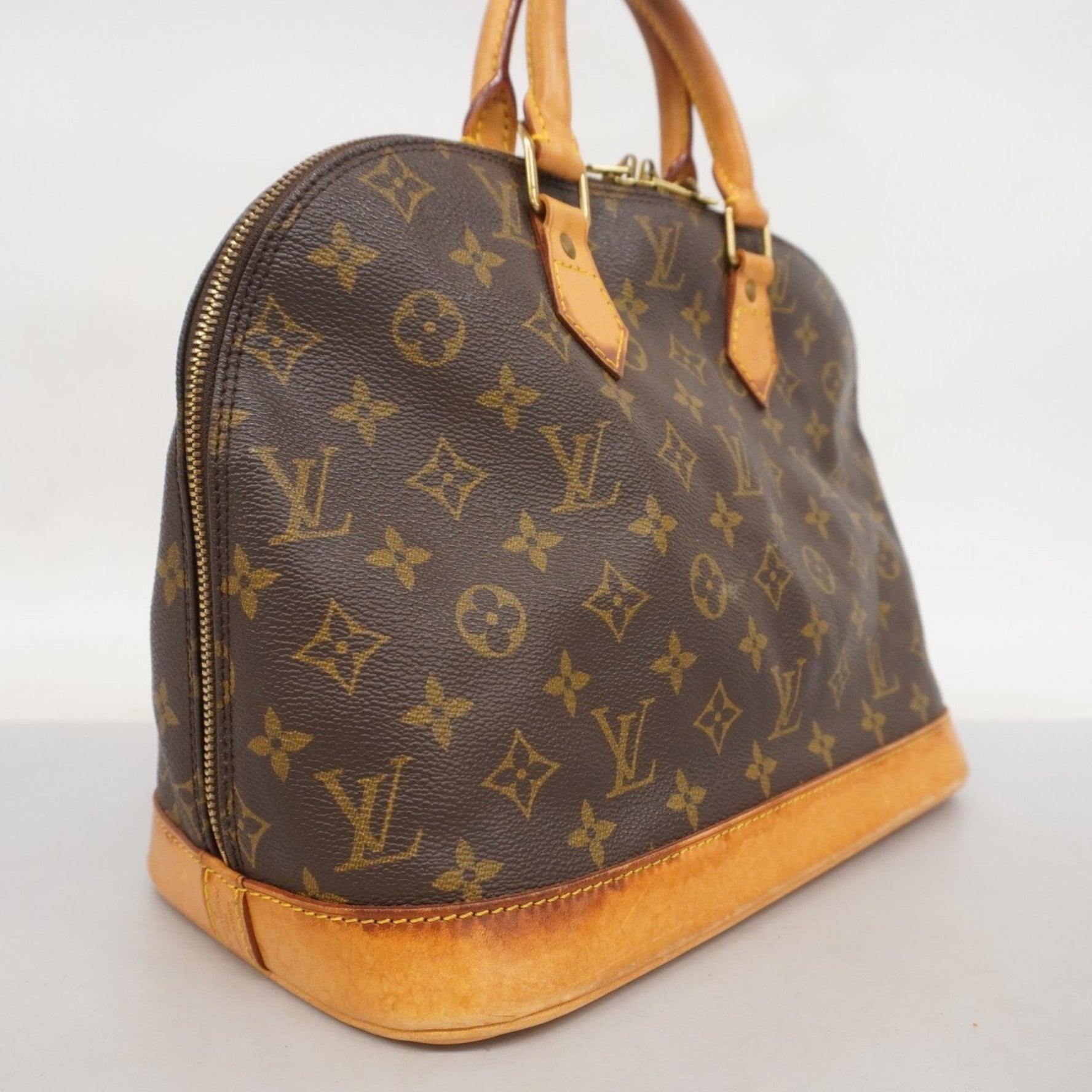 Louis Vuitton Monogram Alma Handbag