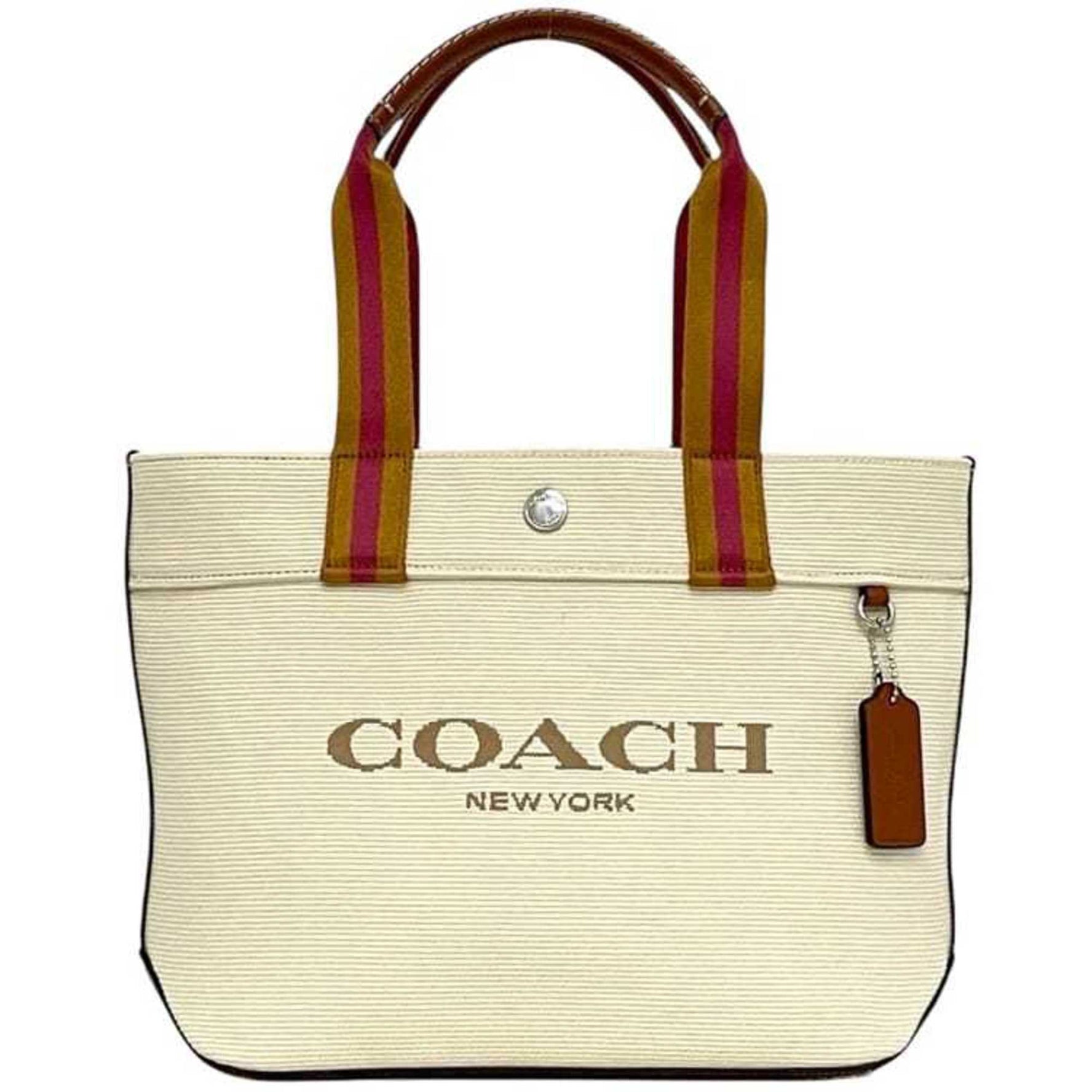 Coach Tote Bag in Natural Beige, Brown, and Multicolor - Canvas Leather. Embroidered printed, this handbag is perfect for both men women.