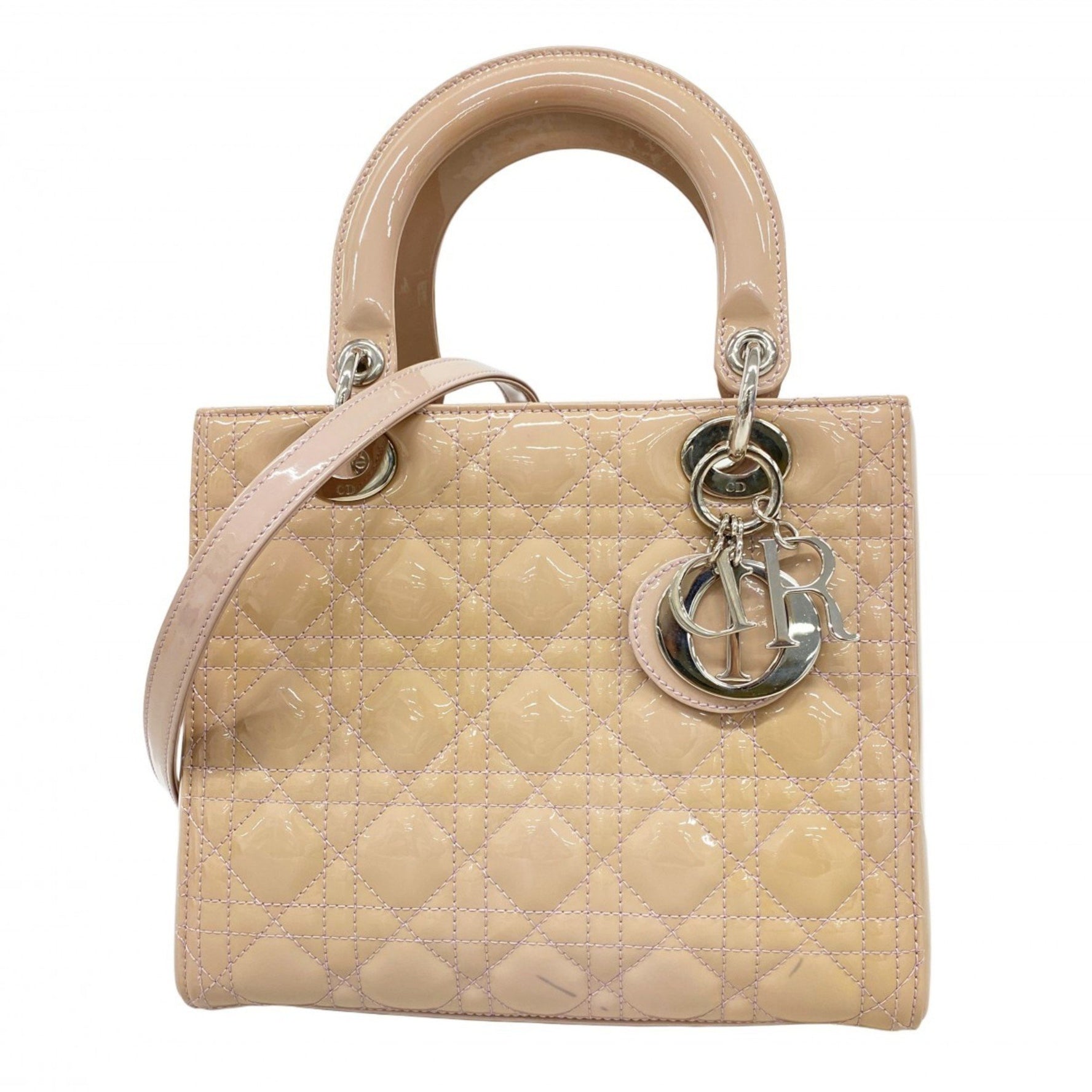 Christian Dior Cannage Lady handbag in beige and purple, a bag .