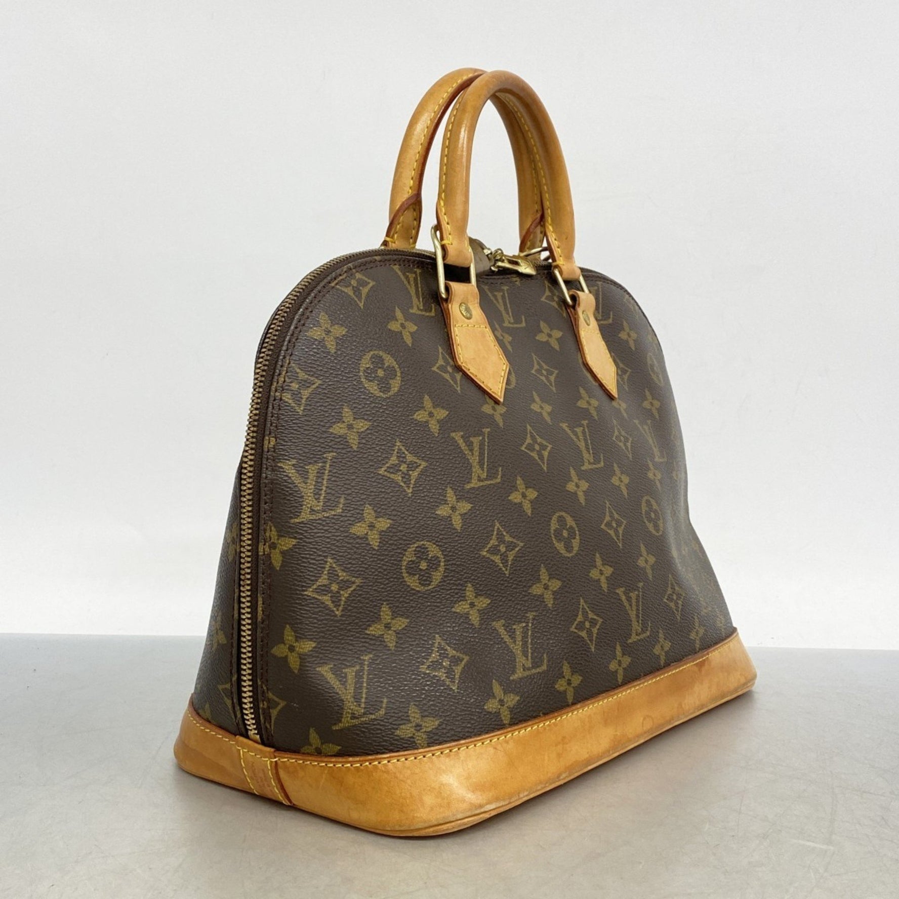 Louis Vuitton Monogram Alma Handbag