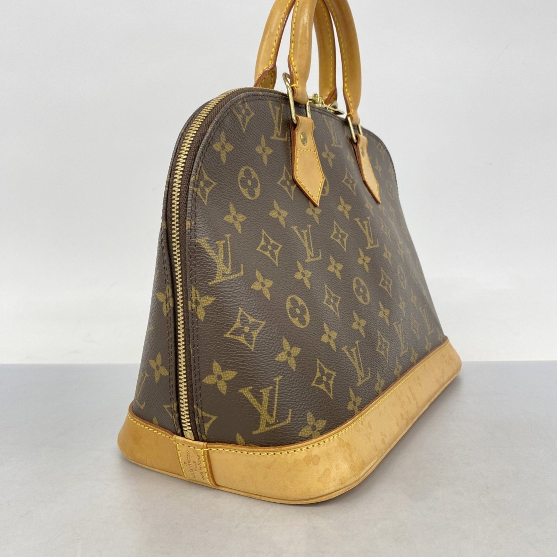 Louis Vuitton Monogram Alma Handbag