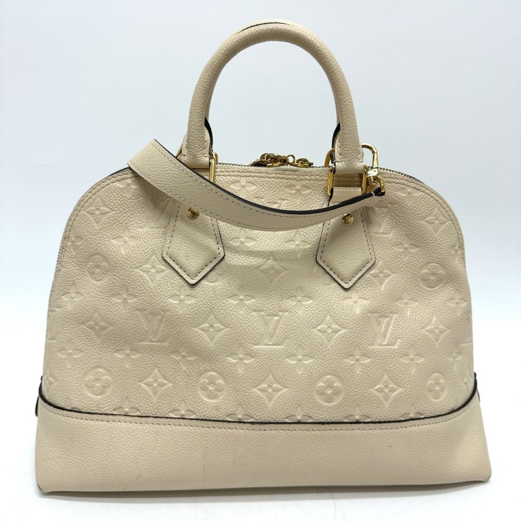 Louis Vuitton Monogram Empreinte Neo Alma PM Handbag in Leather, Tourterelle Crème