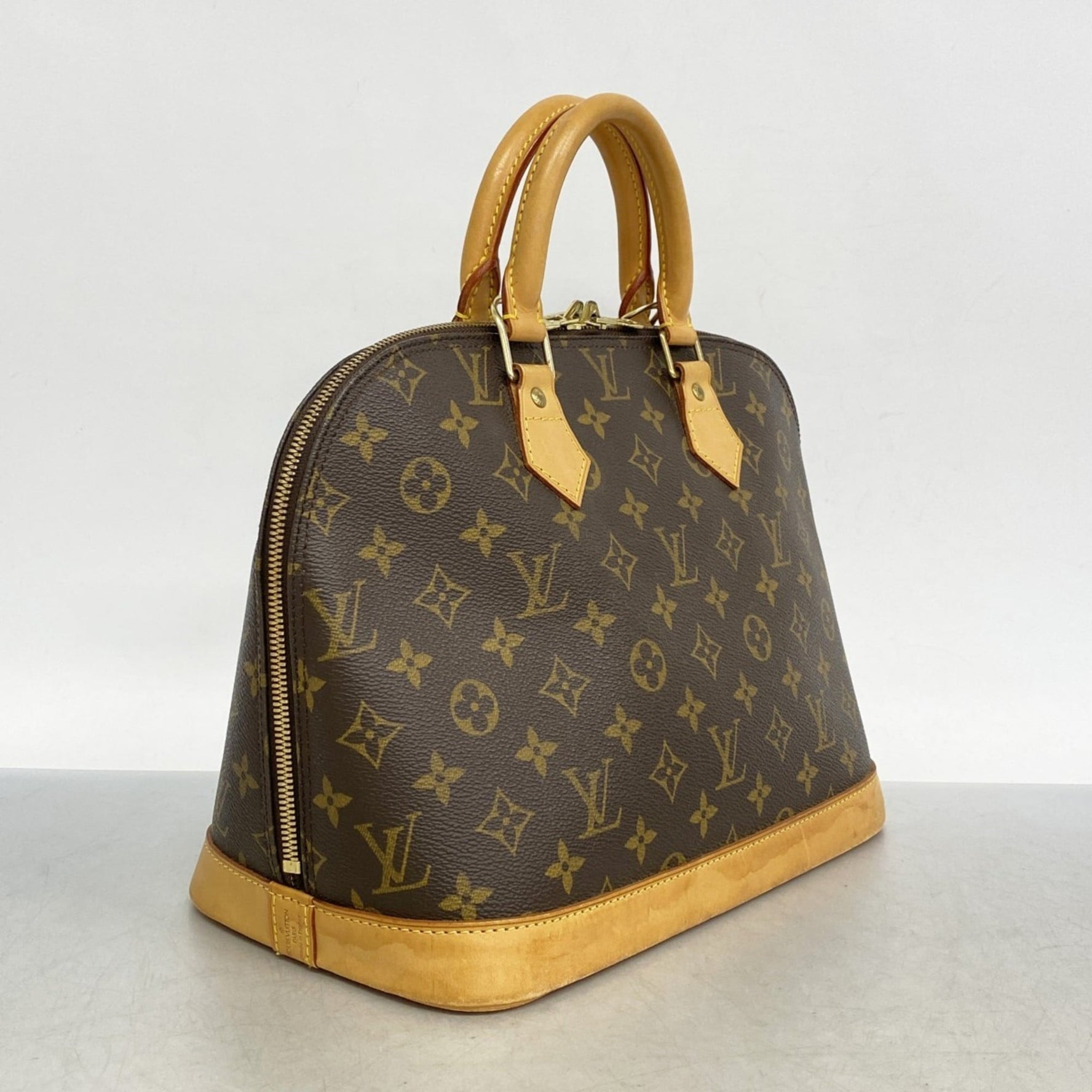 Louis Vuitton Monogram Alma Handbag