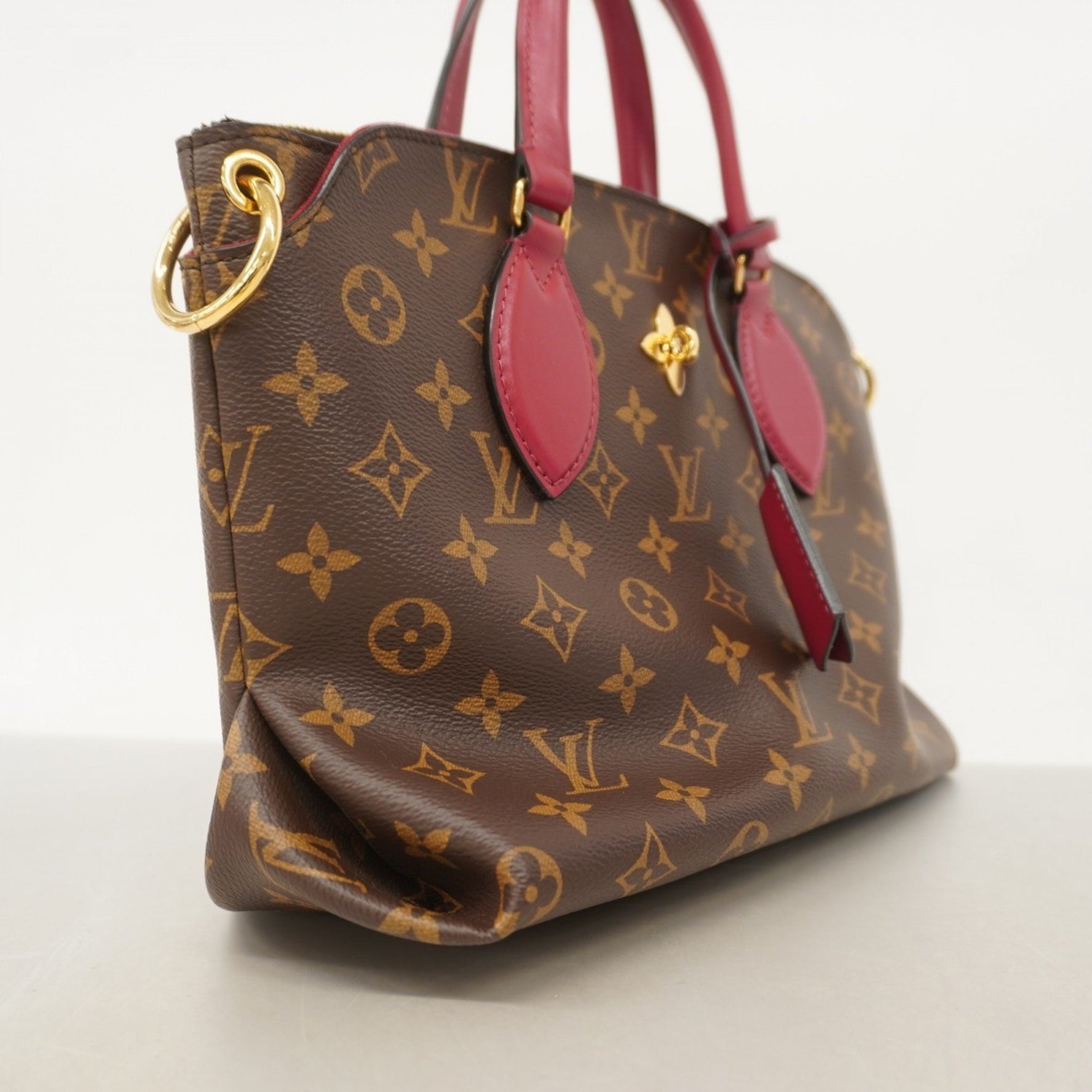Louis Vuitton Monogram Flower Zipped Tote PM a bag .