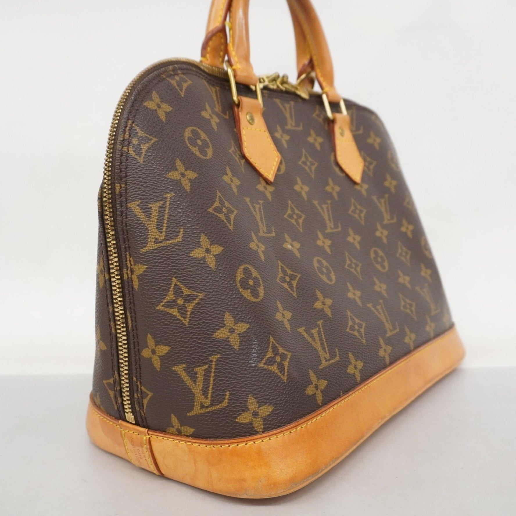 Louis Vuitton Monogram Alma Handbag